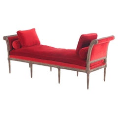 Large Louis XVI style upholstered walnut window bench, C 1900.