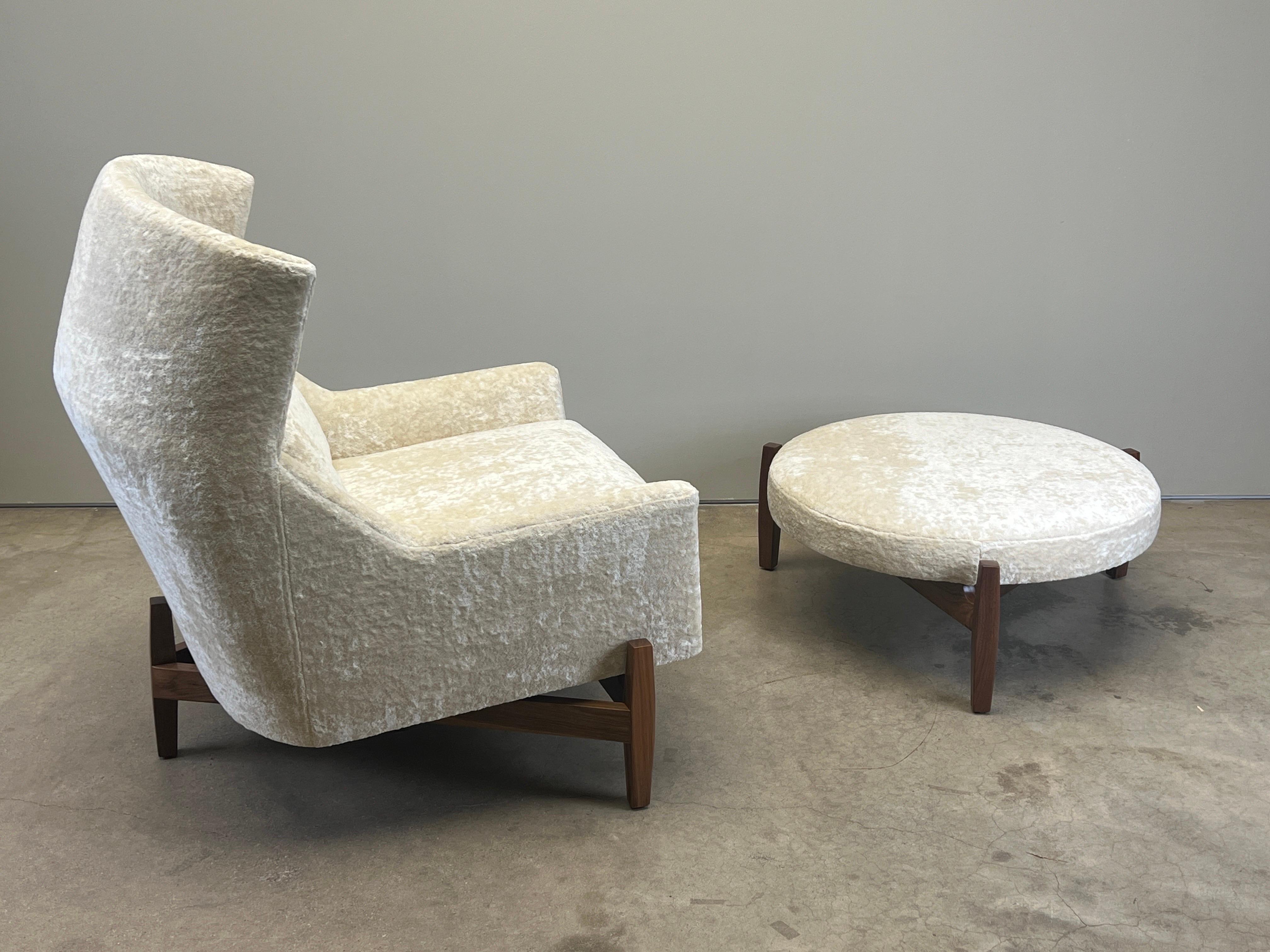 A large scale chair and ottoman designed by Jens Risom for Ralph Pucci. Fully restored and reupholstered in Holly Hunt / Lush / Daybreak fabric. 