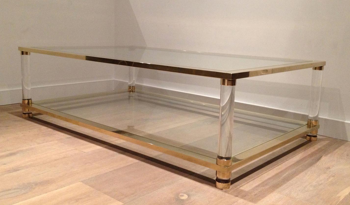 Mid-Century Modern Large lucite and brass coffee table. French work. Circa 1970