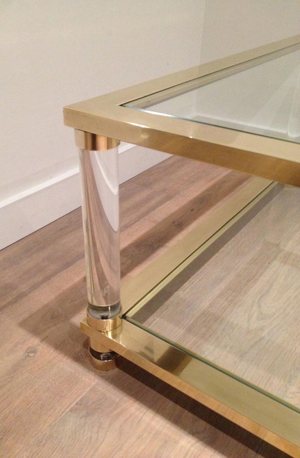 Late 20th Century Large lucite and brass coffee table. French work. Circa 1970