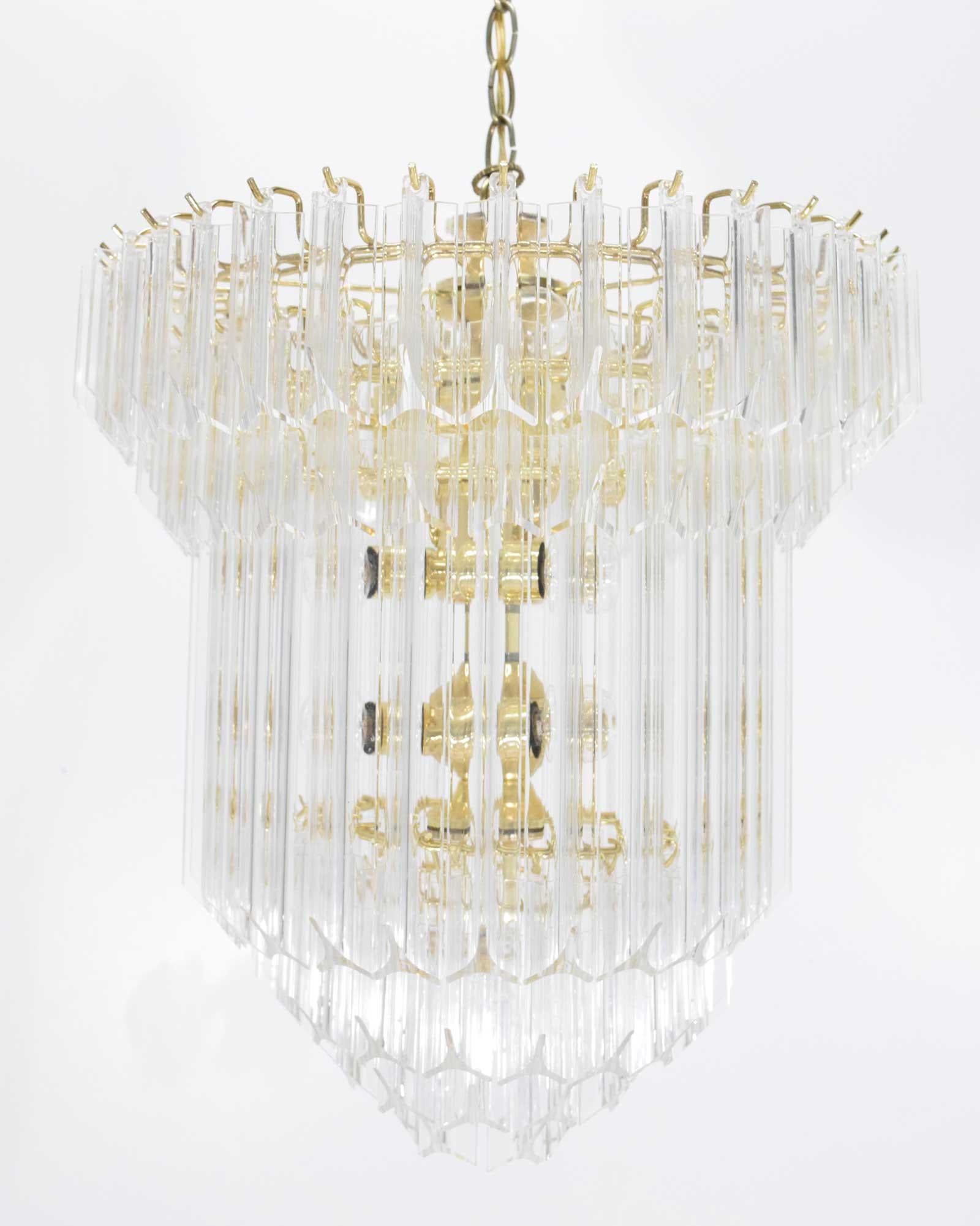 Very nice Lucite, acrylic chandelier with acrylic prisms cascading from a wire frame. Six tiers. Height of 19