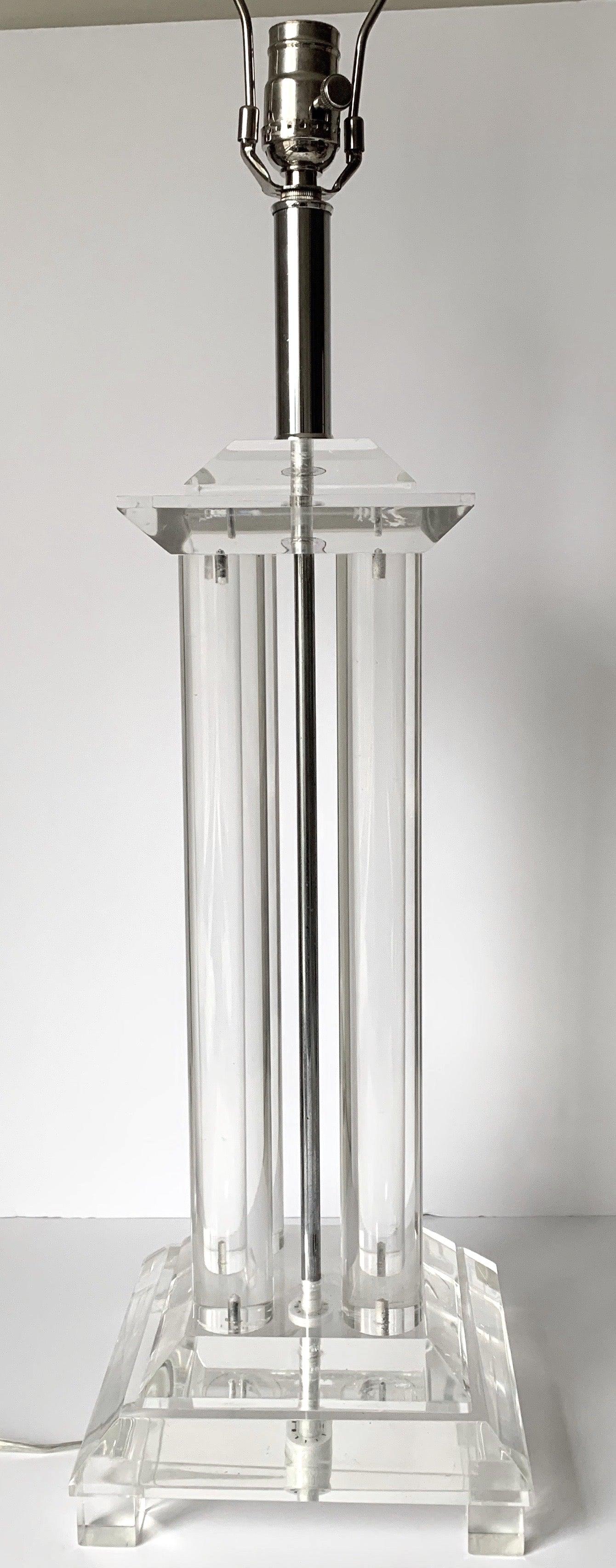 Large 1970s Lucite column table lamp. Newly rewired. Takes one standard bulb. Lamp takes one standard bulb (not included). Lampshade is not included.