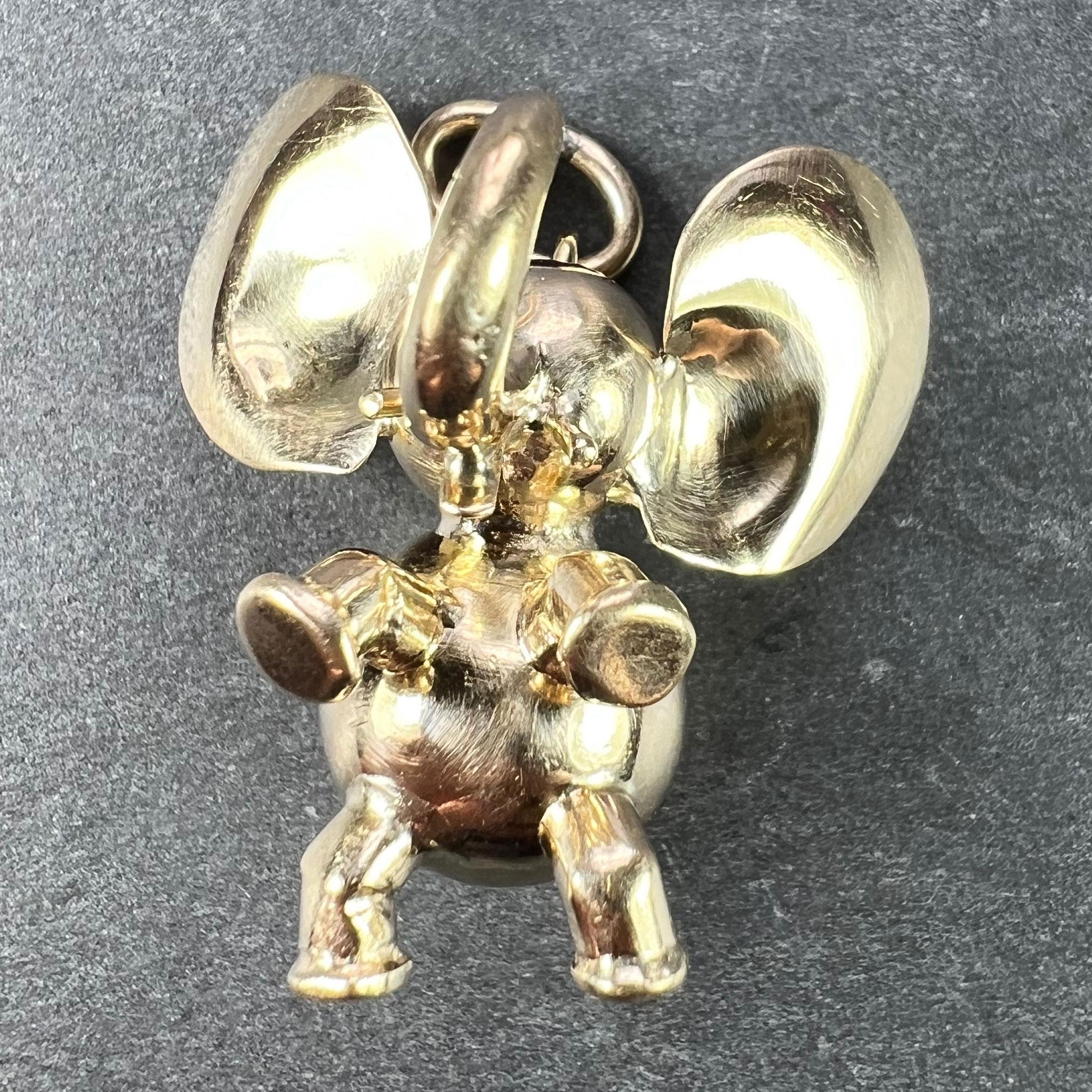 A large 14 karat (14K) yellow gold charm pendant designed as a lucky elephant with large ears. Stamped 585 for 14 karat gold.

Dimensions: 2.5 x 2.3 x 2 cm (not including jump ring)
Weight: 4.57 grams
(Chain not included)
