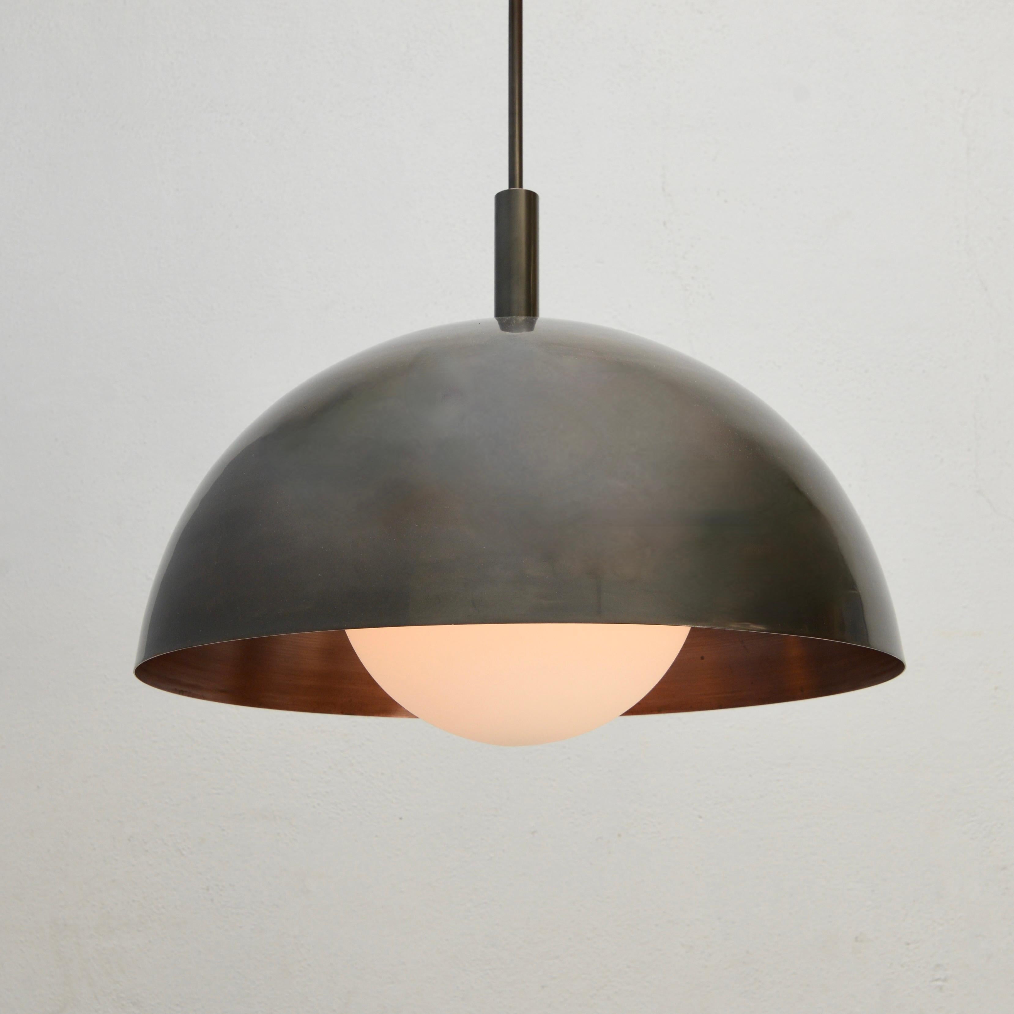 Part of our Lumfardo Luminaires Contemporary Collection, the Large LUdome Copper Pendant is a scale up in dimensions of our LUdome Copper Pendant and is an all copper and glass modern bowl pendant. Made to order. The pendant comes with 1-E26 medium