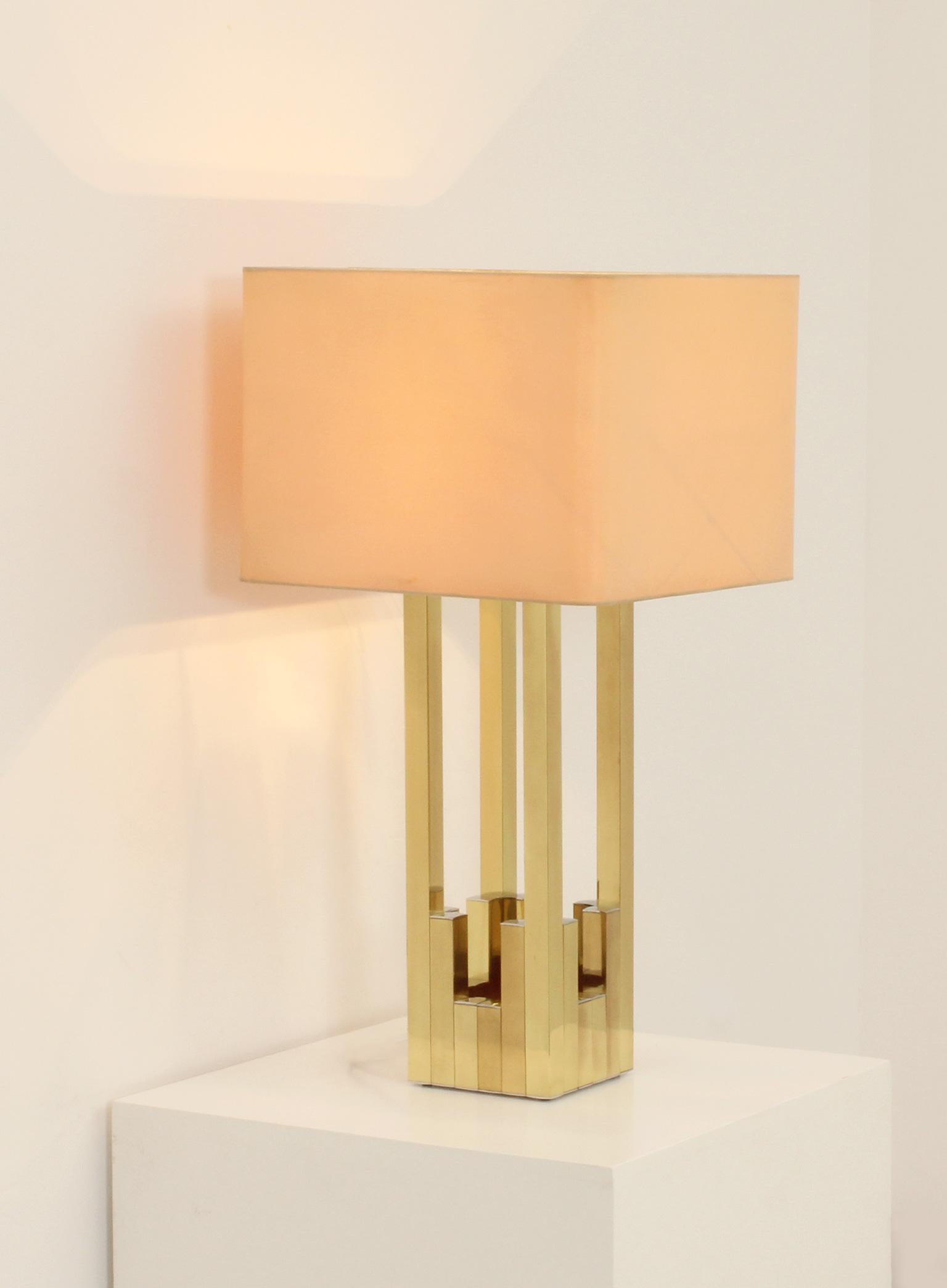 Large table lamp designed in 1970s by BD Lumica, Spain. Brass and chromed metal structure with three bulbs and original shade.
