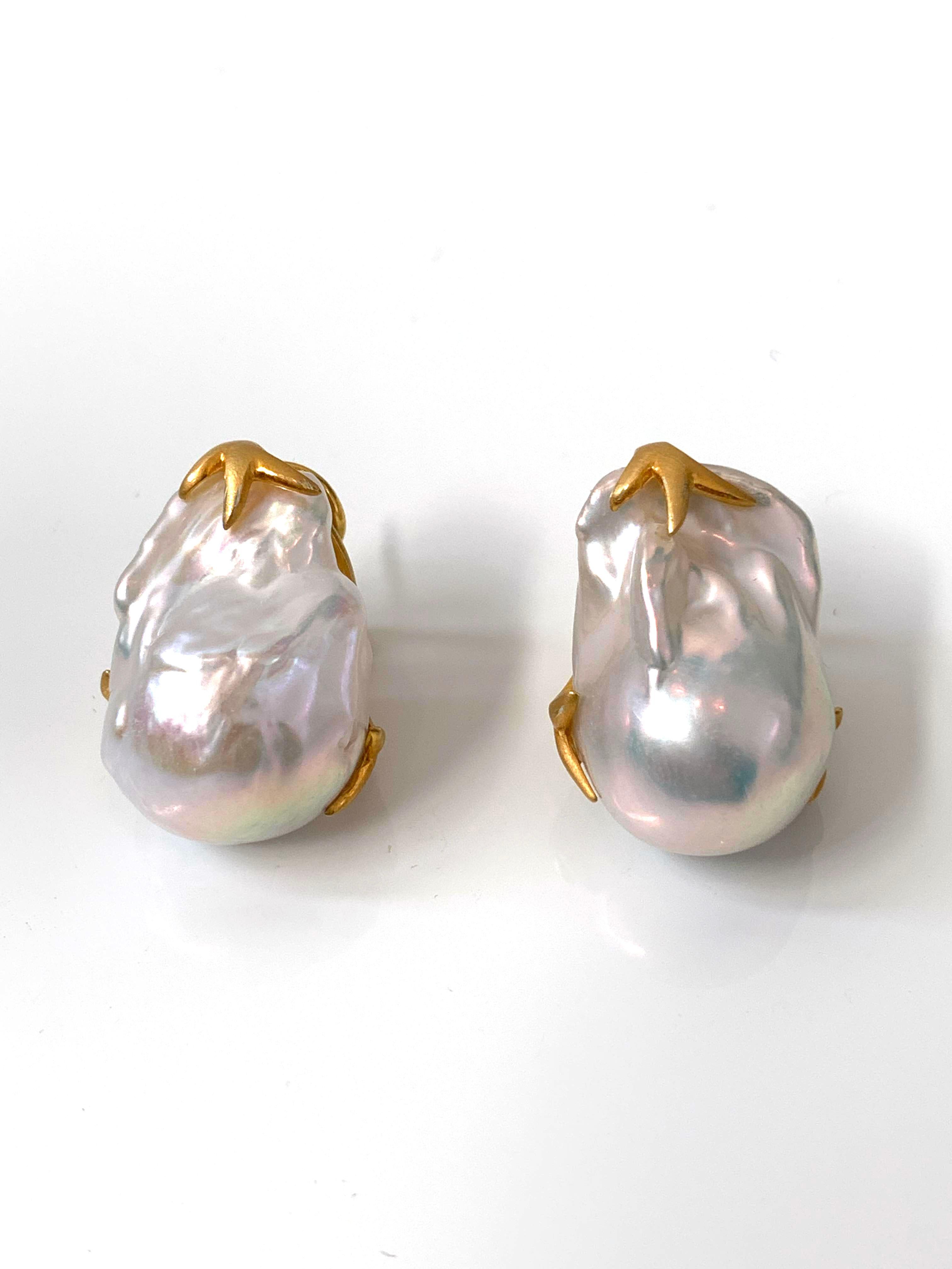 Beautiful pair of large lustrous freshwater baroque pearl earrings. The pair measures 15mm width and 23mm height, handset in vermeil 18k gold-plated sterling silver (matte finish). Post-clip backs provide addition support (Very comfortable). 

Each