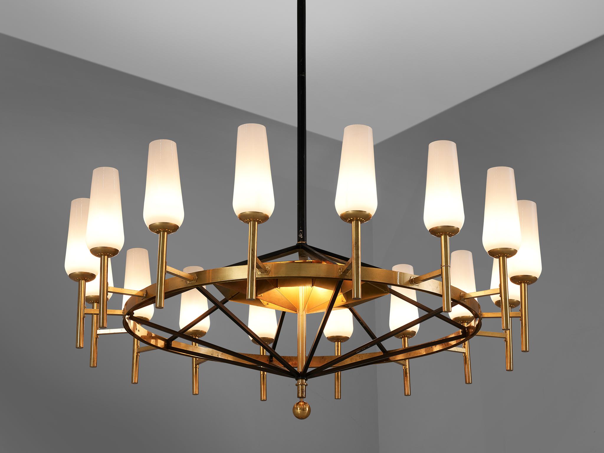 Uno and Östen Kristiansson for Luxus, large chandelier, brass, hand blown opaline glass, metal, Sweden, 1960s

Large and exquisite chandelier in brass, designed by Uno and Östen Kristiansson for Luxus in the 1960s. This chandelier features sixteen