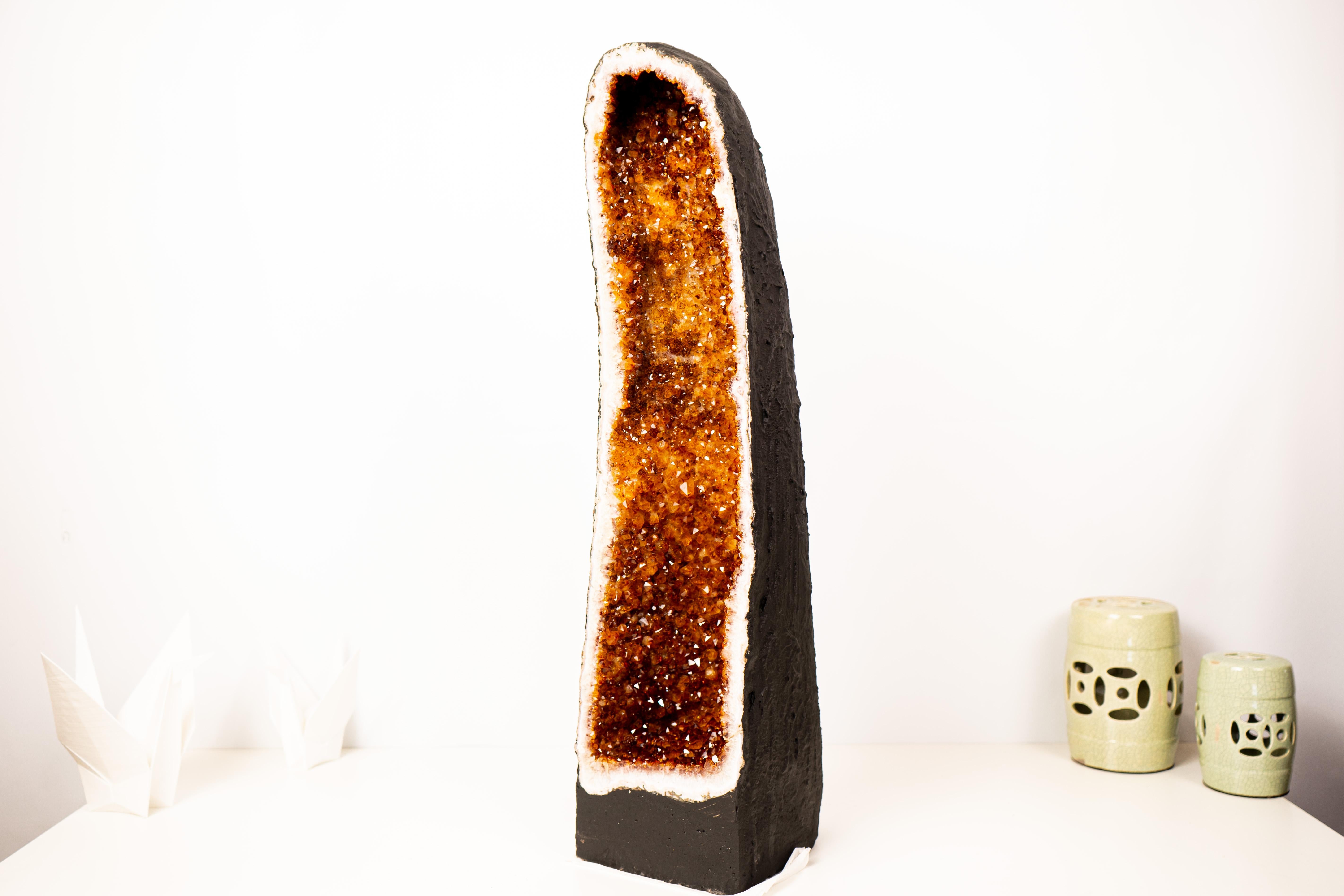 Sculptural Large Cathedral Citrine Geode with Sparkly Madeira Citrine Druzy 

▫️ Description ▫️

Showcasing the highly sought-after deep orange druzy known as Madeira Citrine, this large citrine geode features a stunning, tall cathedral formation.