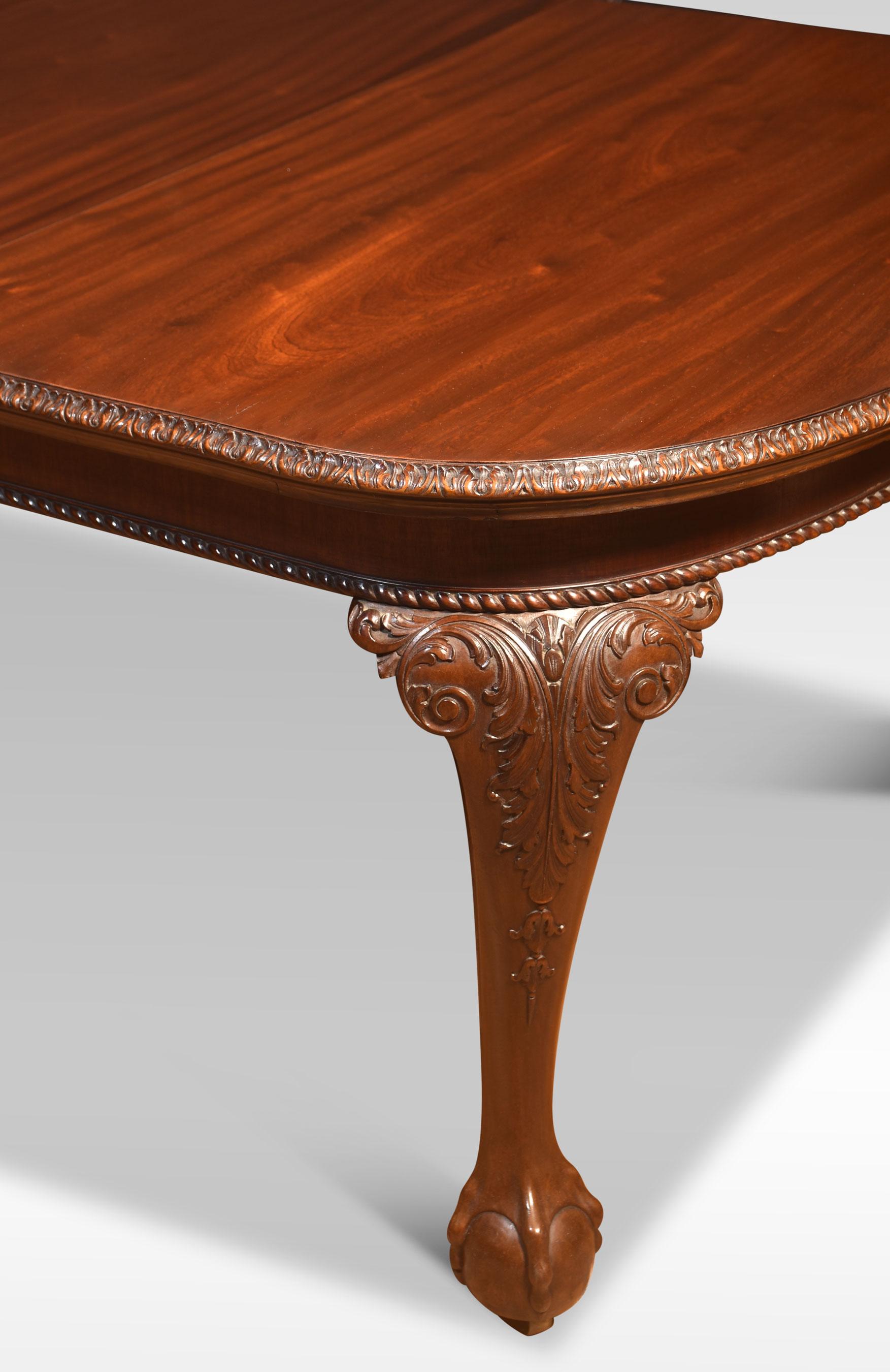 Mahogany dining table, the rectangular top with oval ends having moulded edge to the telescopic action, with solid runners opening to incorporate four leaves. All raised on cabriole legs terminating in claw and ball feet, having recessed castors.