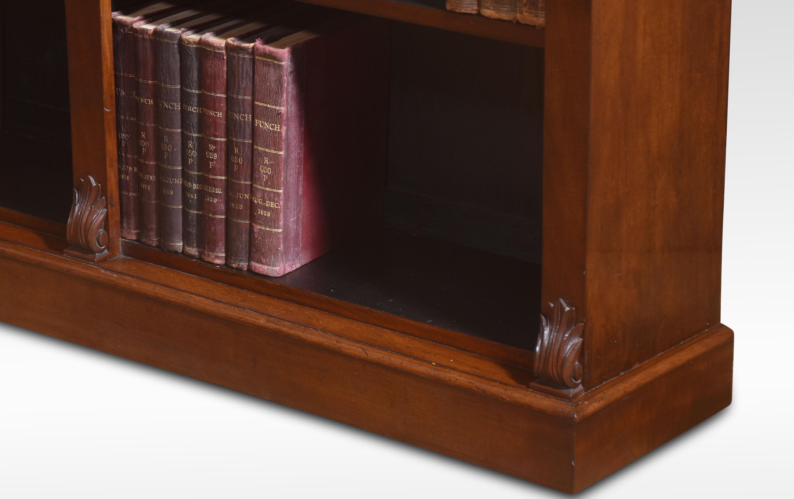 Mahogany open bookcase, the projecting cornice, above two bays of adjustable shelves divided by scrolling capped columns. All raised on a plinth base.
Dimensions
Height 59.5 Inches
Width 60 Inches
Depth 13 Inches