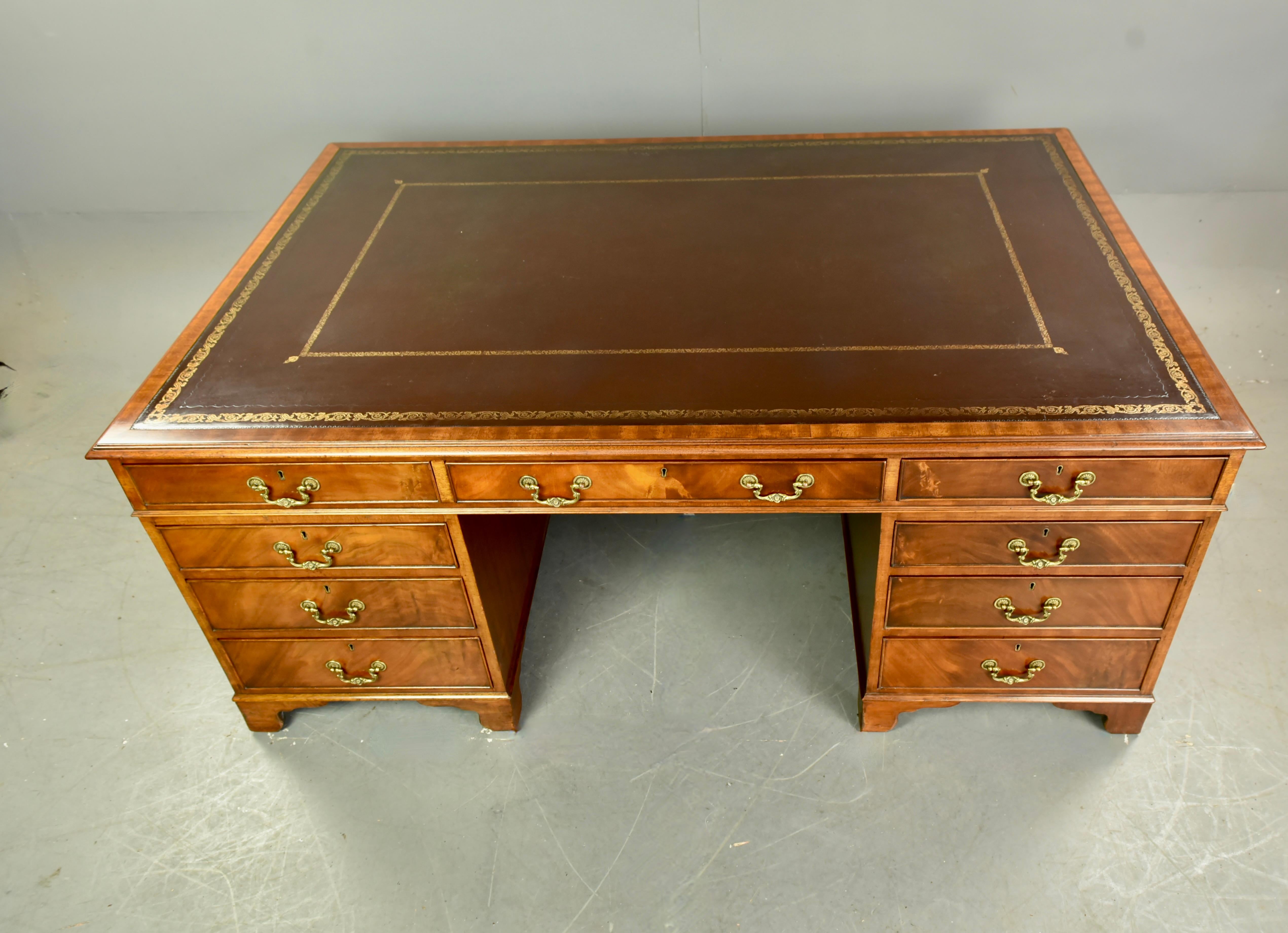 Large mahogany partners desk circa 1920 .with Provenance: The desk was once owned by Sir Maurice Hodgson (British 1919-2014) He was most famous for being the chairman of chemical giant ICI from 1978-1982. He was also chairman of British Home Stores