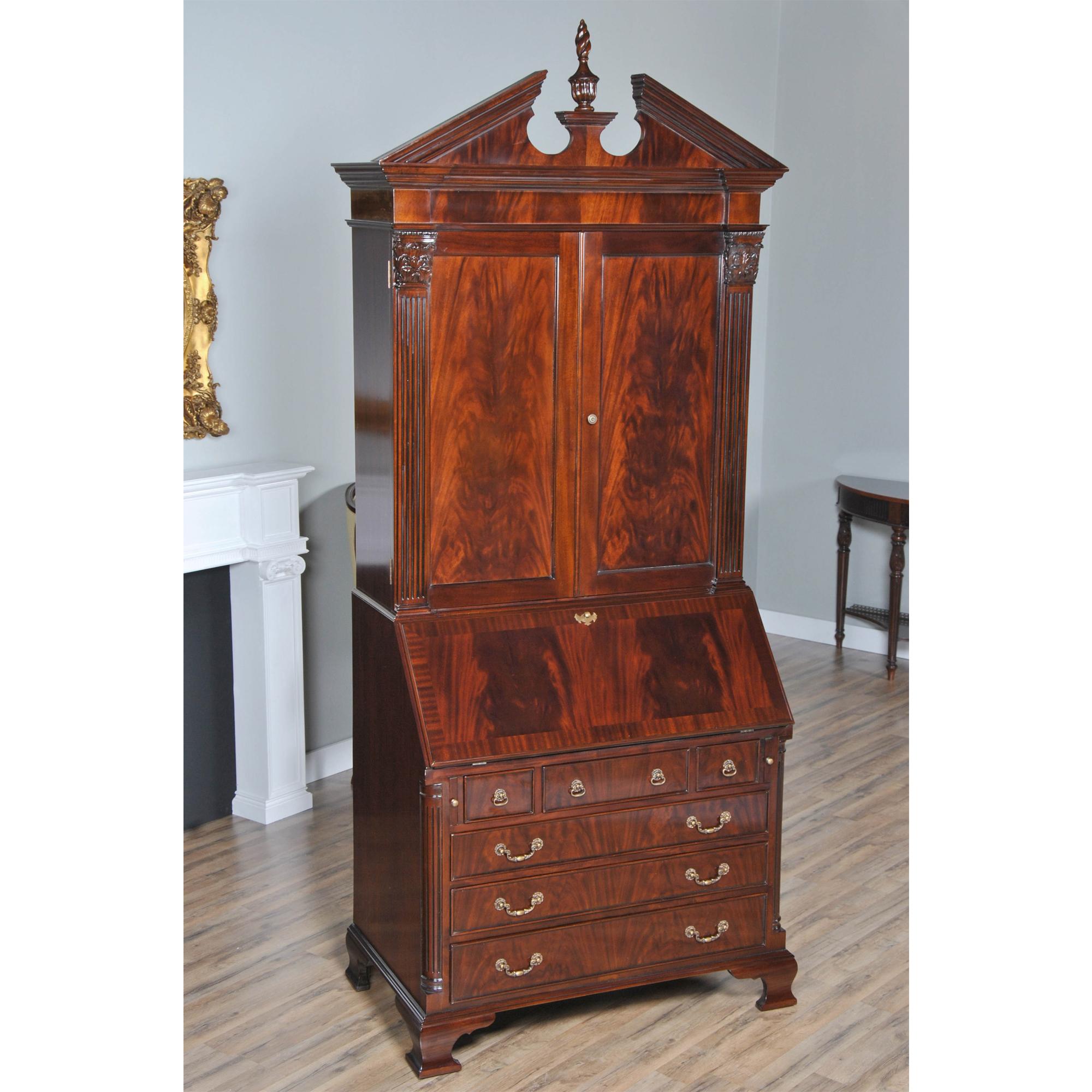 Inspired by an antique desk and bookcase this Large Mahogany Secretary Desk from Niagara Furniture is impressive in both it’s design and scale. Made of beautifully grained mahogany, the bookcase features a removable pediment top section with