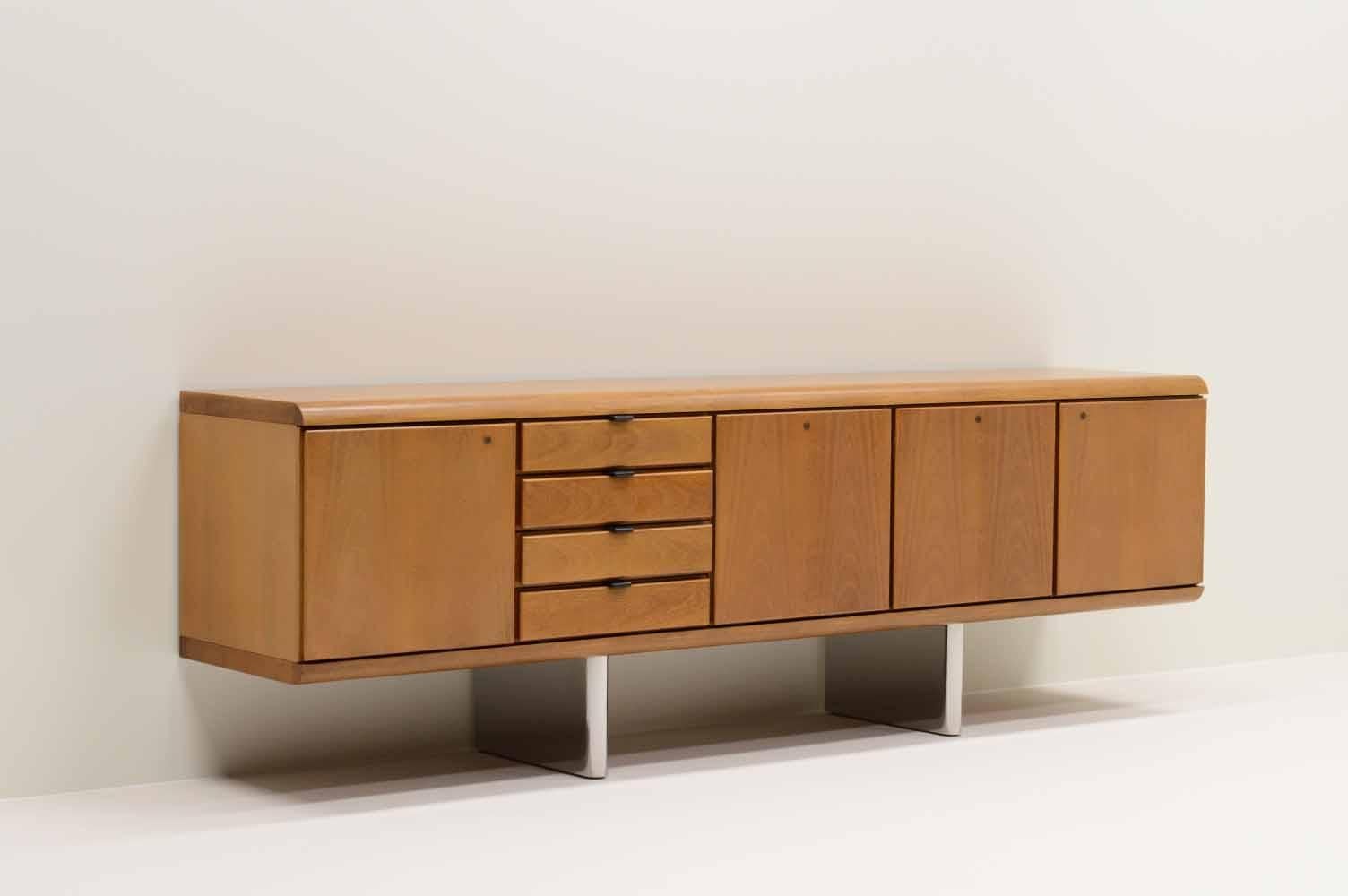 Large mahogany sideboard by Hans von Klier for Skipper, Italy, 1970s. High quality sideboard with stainless steel chrome legs, 4 drawers, 2 doors with glass shelf, large drawer with bar insert and larg drawer for files. Can be used as room divider
