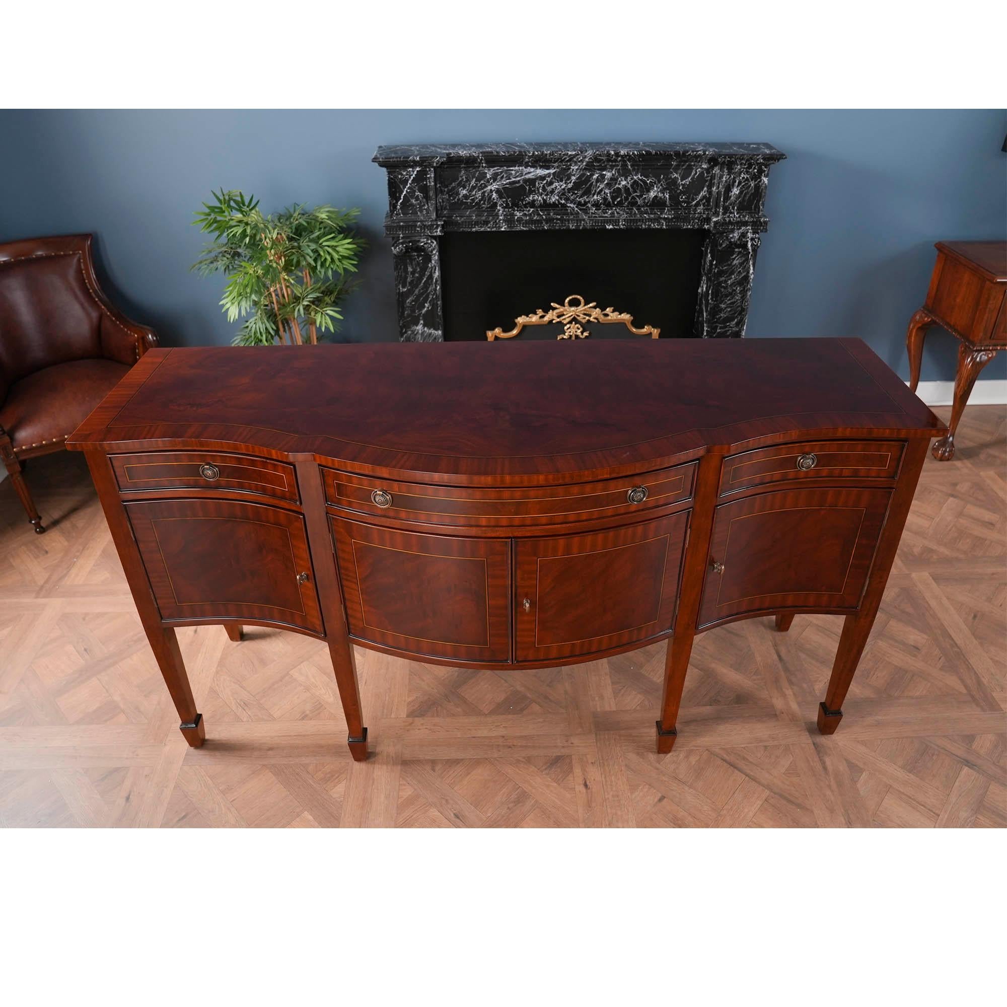 Simple yet sophisticated the Large Mahogany Sideboard has everything going for it. A slightly larger size than many of our other high leg sideboards this item boasts a great amount of storage space featuring three drawers over four doors. The