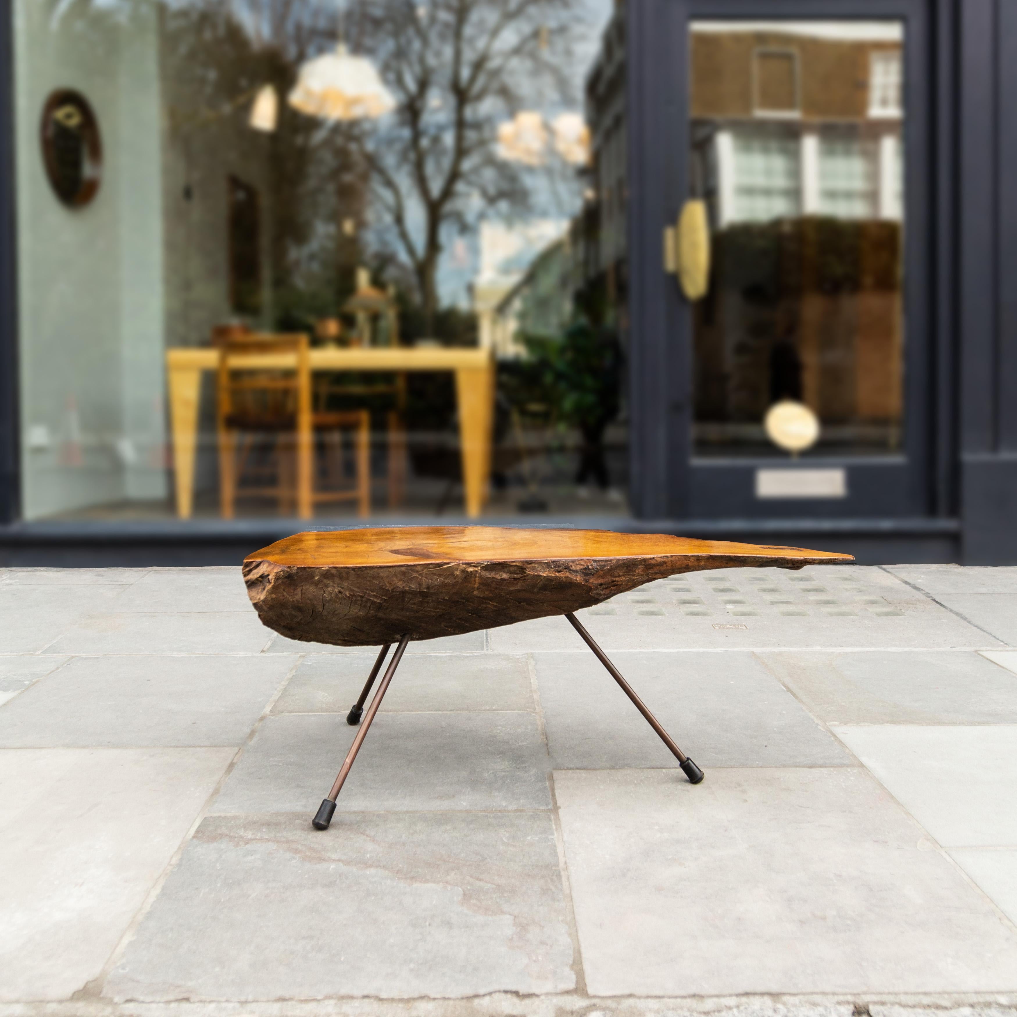 A substantially sized tree trunk table designed and made by the Werkstätte Auböck in the 1940s. Carl Auböck II, responsible for the design of this series, graduated from the Bauhaus under Johannes Itten (a Swiss Expressionist painter, designer and