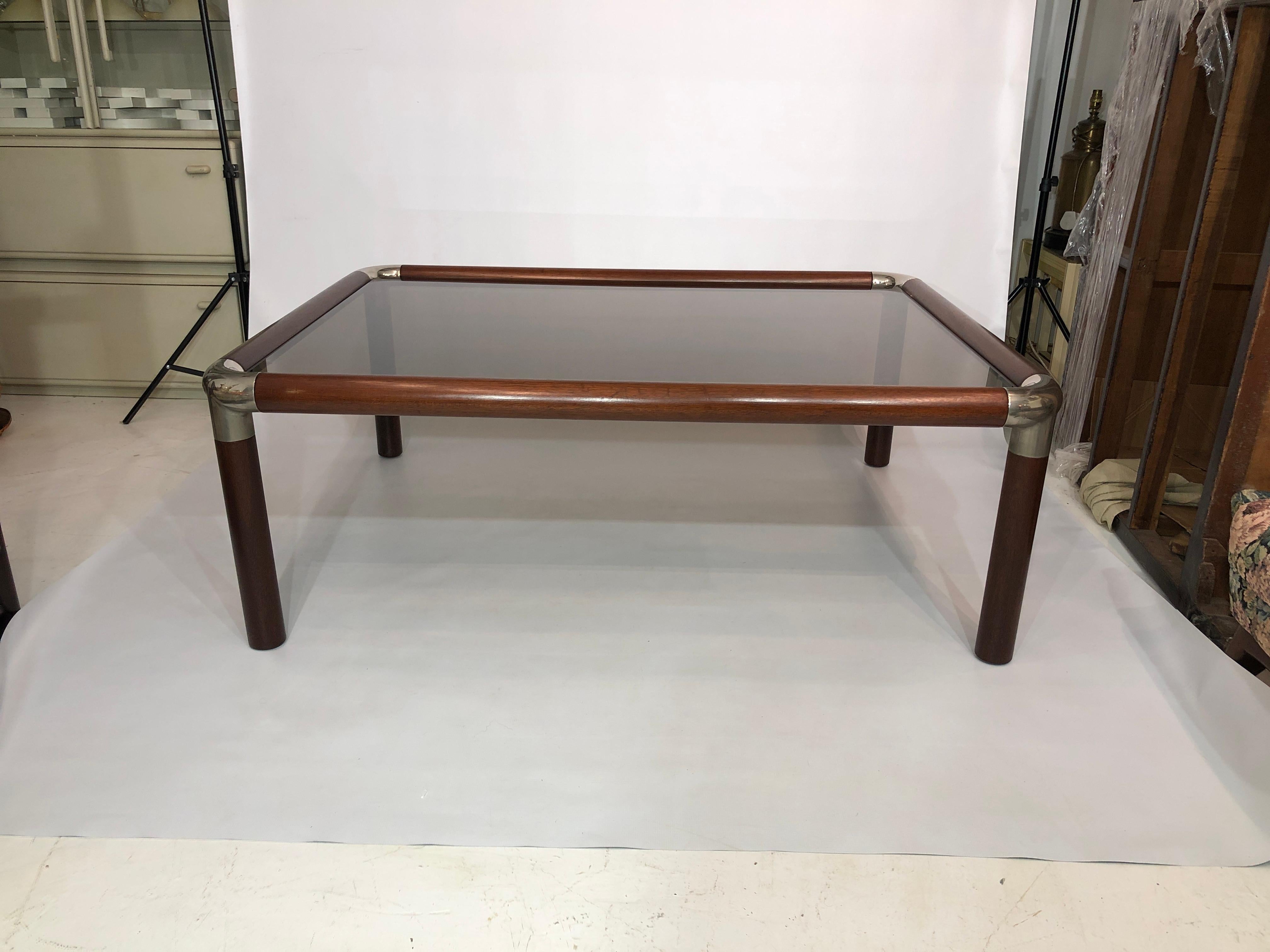 A large and impressive 1970’s Ronald Schmitt designer coffee table. Possibly designed by Rodney Kinsman as it is similar to the Model T14 he designed for Bieffeplast in the 1970’s. 

The table frame is mahogany which we have restored and refinished