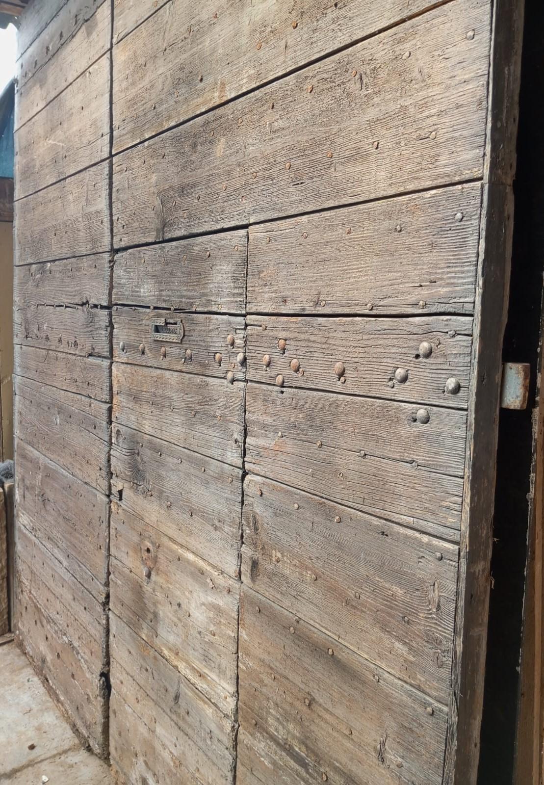 Italian Large Main entrance door double-leaf nailed chestnut, Italy For Sale