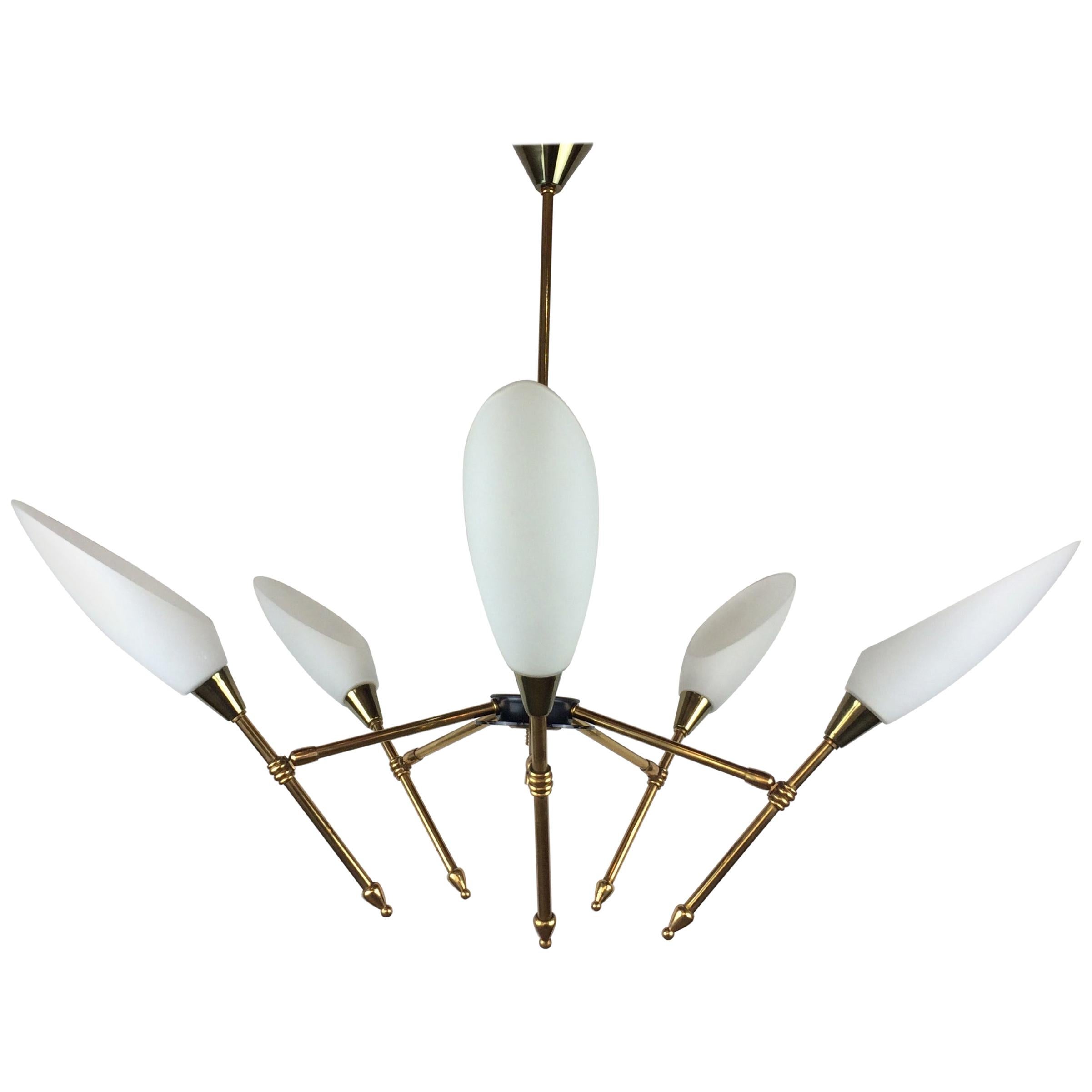 Iconic, rare, unique and with remarkable dimensions, Maison Arlus high design chandelier produced in France in the 1950s-1960s.

The peculiarity that distinguishes this chandelier is its innovative form of that period, the structure of directional,