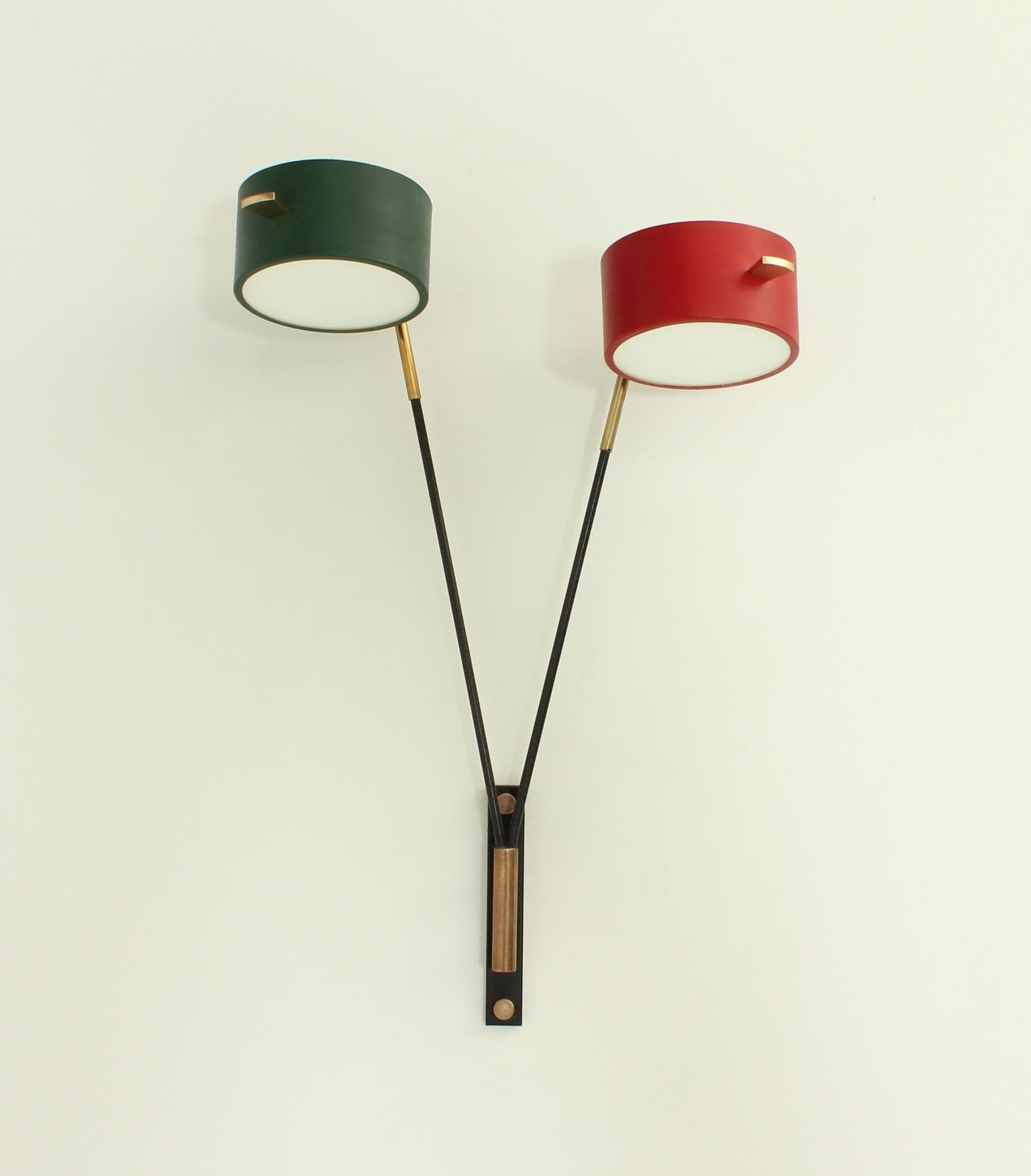Large sconce by Maison Lunel, France, 1950's. Adjustable shades with moveble kneecap and fixed arms. Lacquered metal, brass and white opal glass.