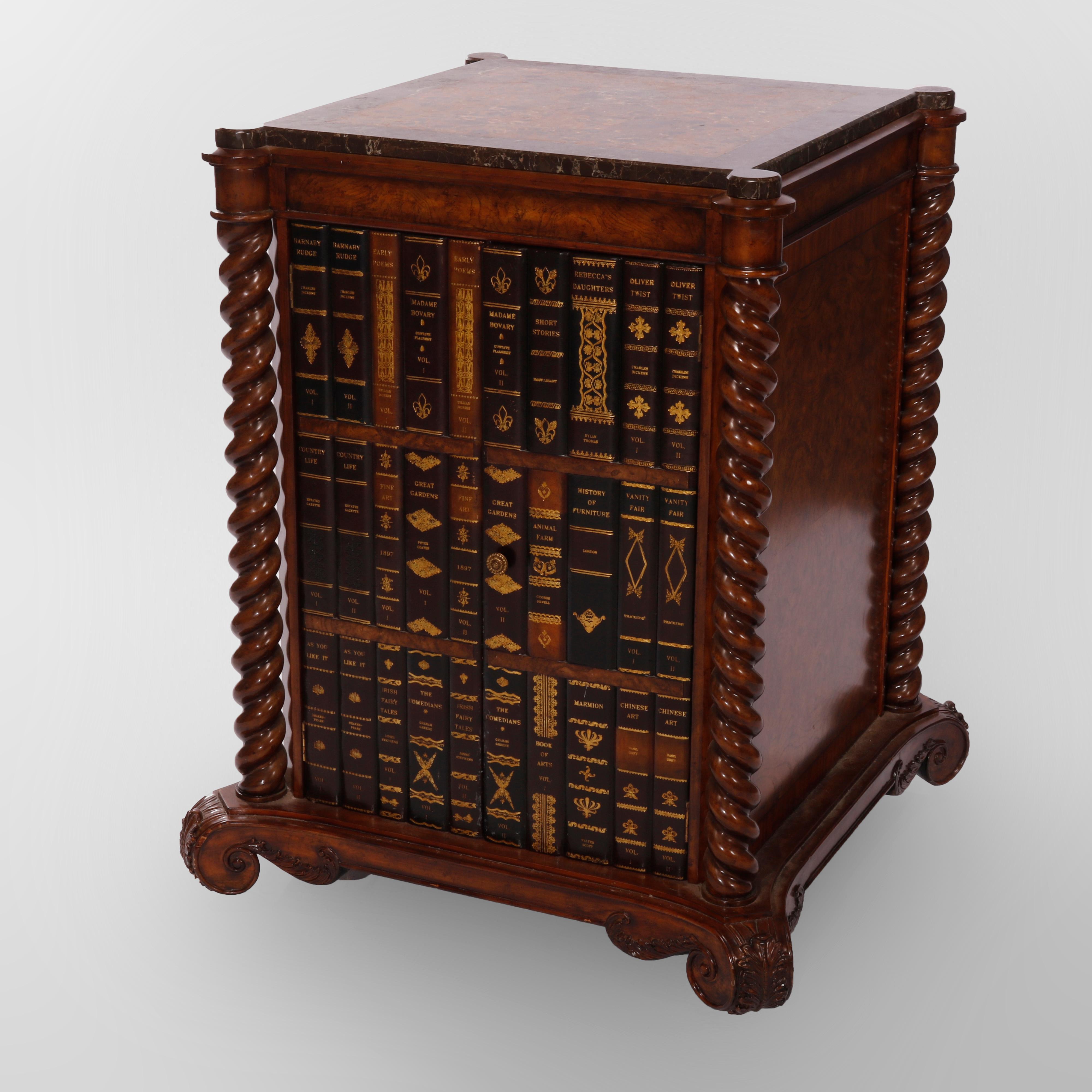 An oversized wine cask by Maitland Smith offers specimen marble top over walnut and burl case having double door with tooled and gilt leather faux library book facing opening to cellar and flanked by carved rope twist columns, raised on scrolled