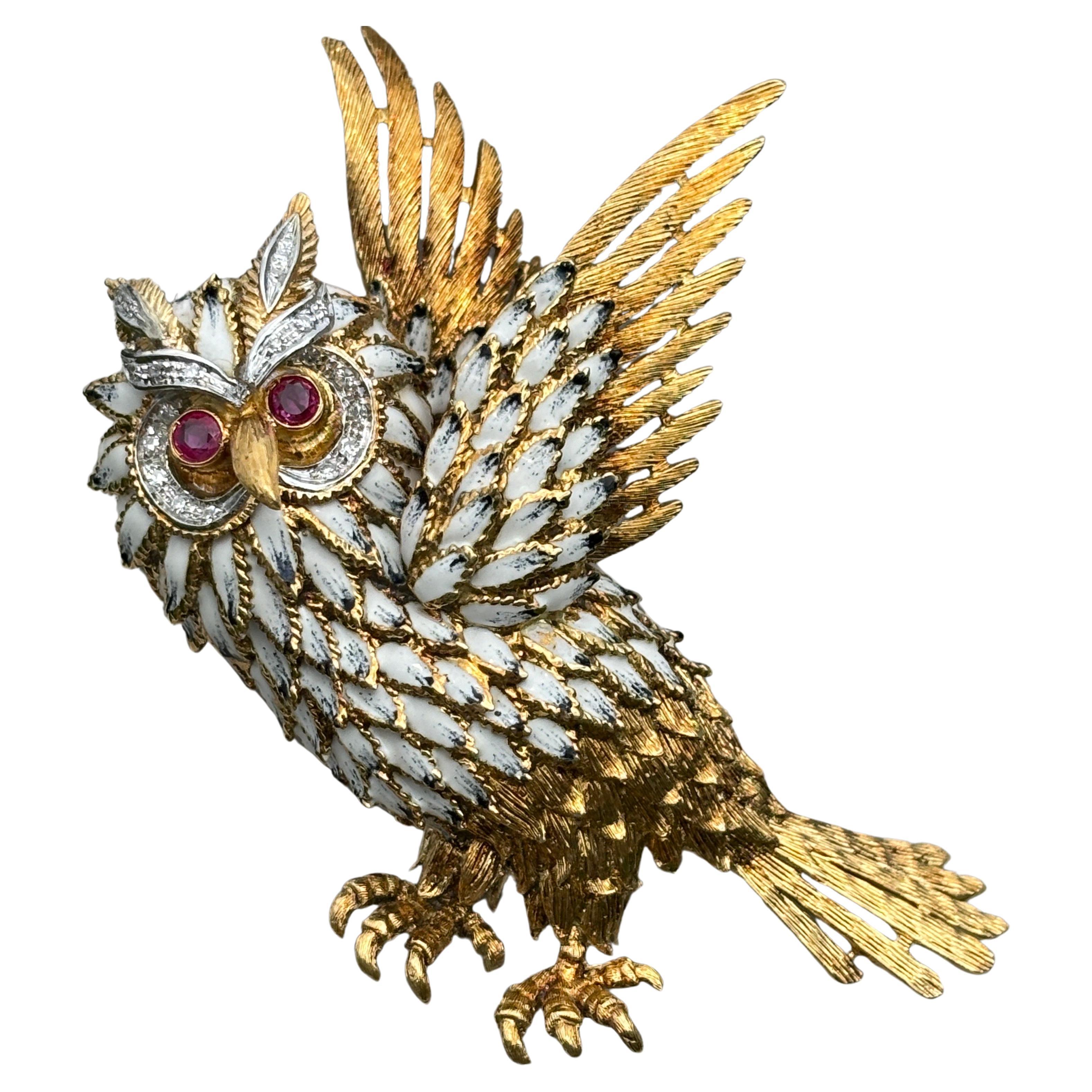 Up for your consideration is this large outstanding majestic owl brooch crafted from 18k yellow gold and adorned with Italian enamel, rubies, and diamonds. 

This owl  is a beautiful representation of vintage,antique gold jewelry craftsmanship. It's