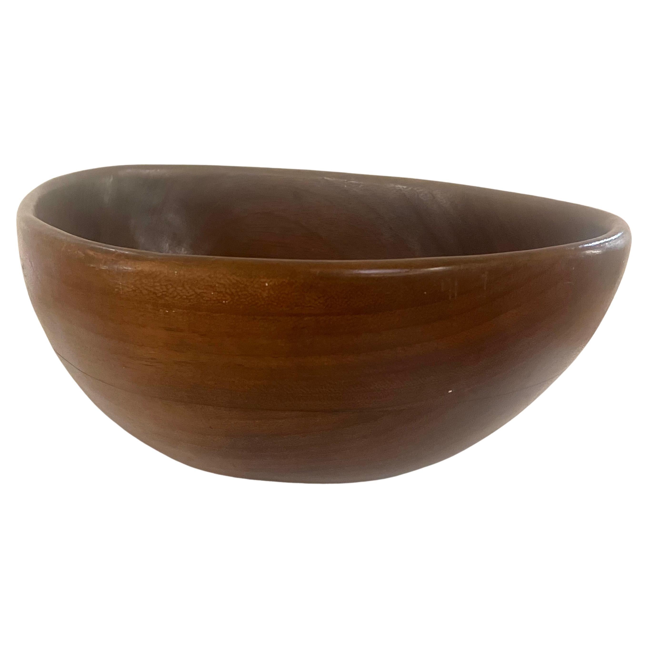 large ear-shaped solid walnut carved bowl great for fruits or salad nice clean original condition.