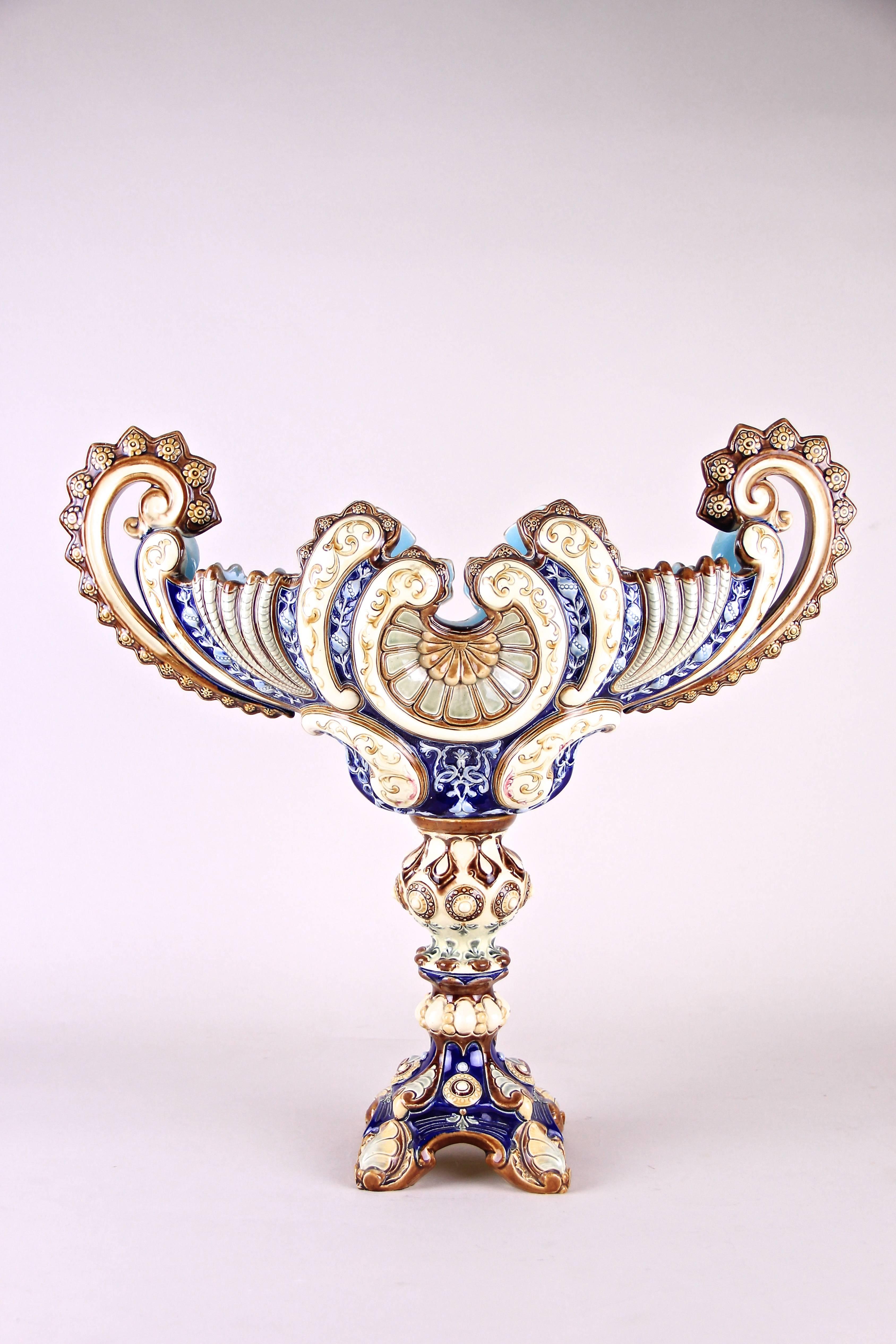 Breathtaking large Majolica centrepiece/ jardiniere from circa 1890. Made by the famous company of Wilhelm Schiller & Son in Bohemia this rare majolica masterpiece showing a beautiful sea-related design with nice shells as the main center. The