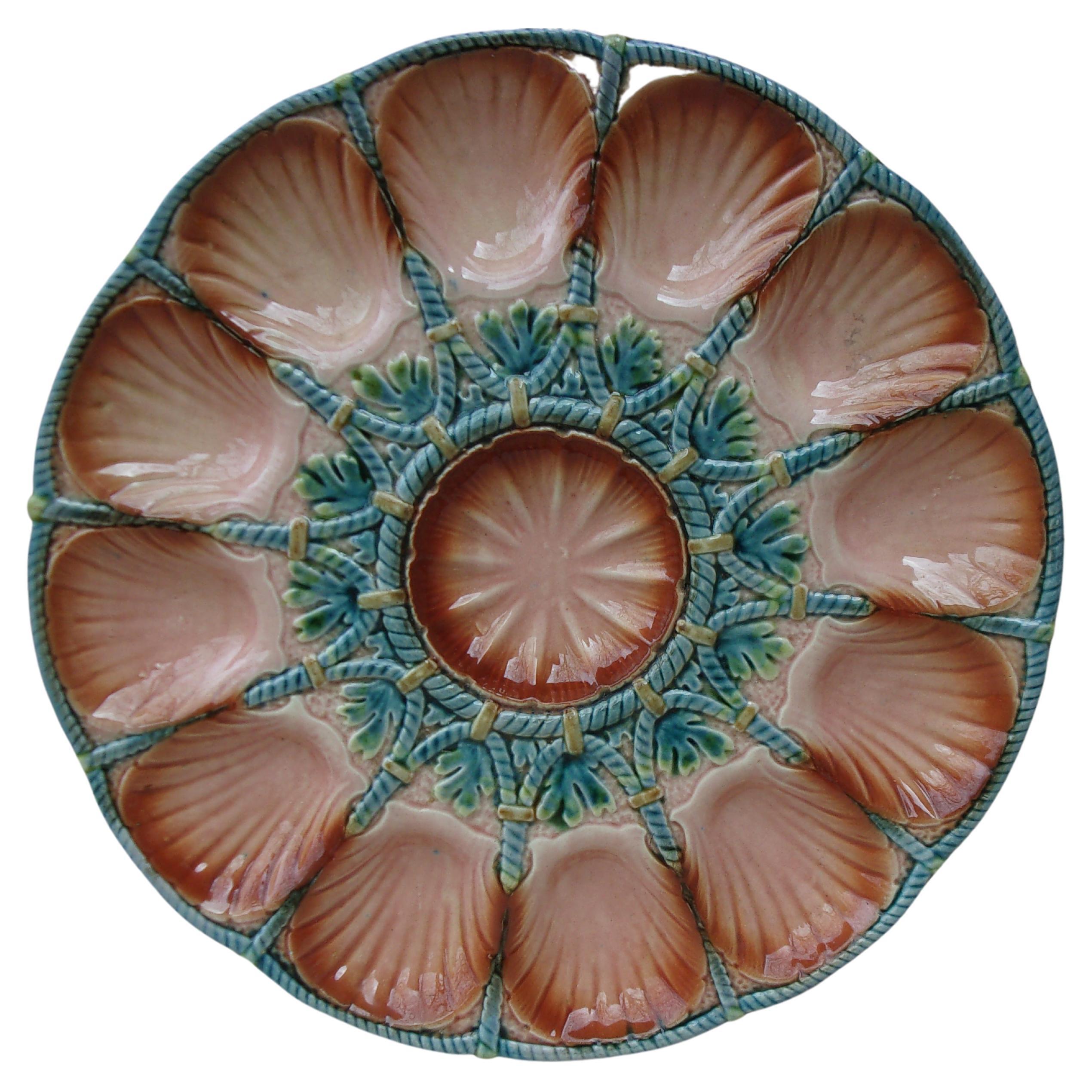 Large French Majolica oyster platter signed Sarreguemines circa 1890.
Diameter / 14.5