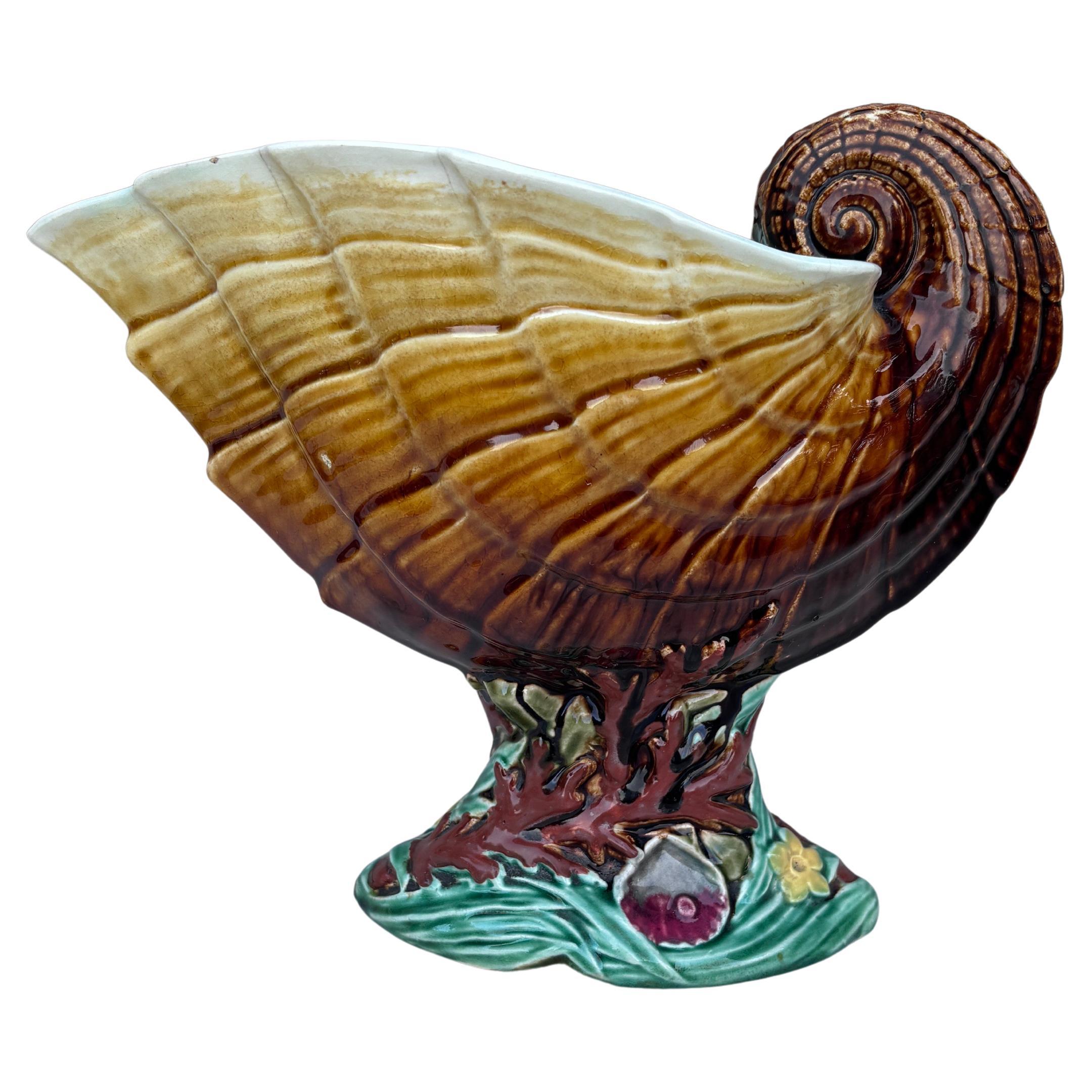 Large Majolica Shell Nautilus Vase Urn signed Choisy Le Roi, circa 1890.
The base is decorated with shells and coral.
H / 8 inches , W / 10 inches.