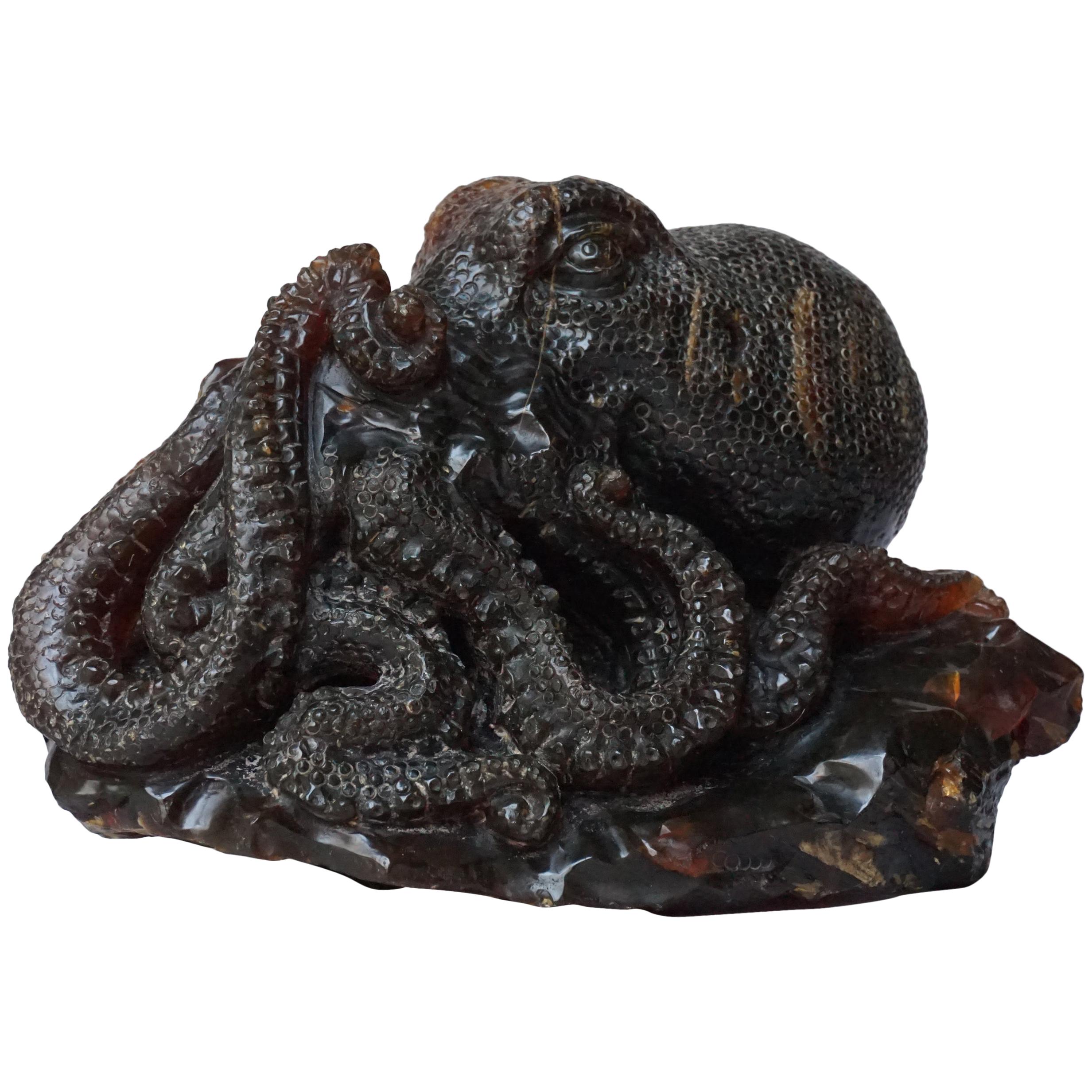 Large 20th century Malaysian Sarawak Borneo Carved Dark Amber Octopus For Sale