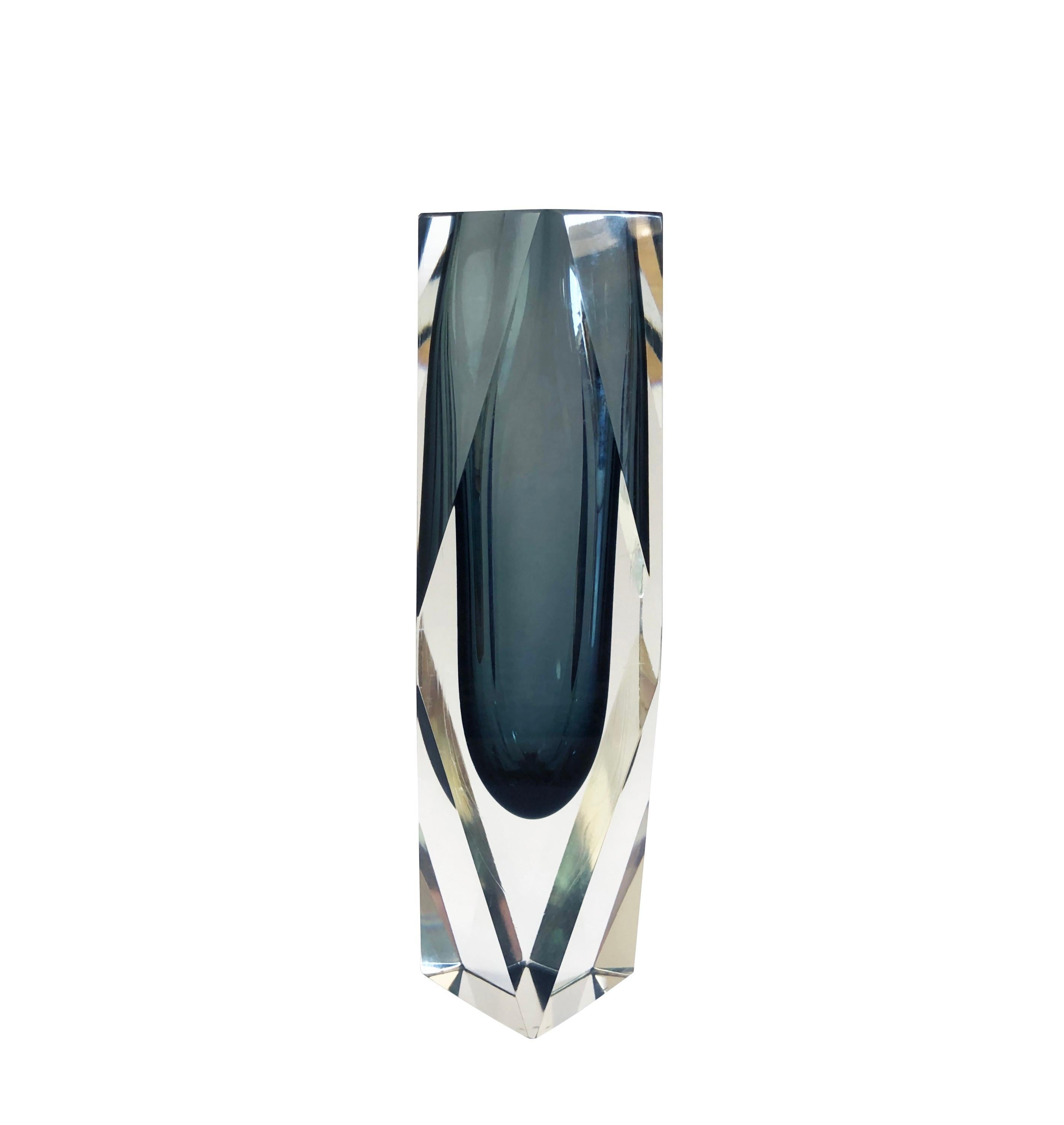 Attributed to the hand of Alessandro Mandruzzato.
Large Venetian Murano Sommerso faceted heavy vase.
Original from the 1960s to 1970s, Italy, Murano.
Gorgeous cut glass in an intricate faceted shape, heavy and in a wonderful smoke grey at the