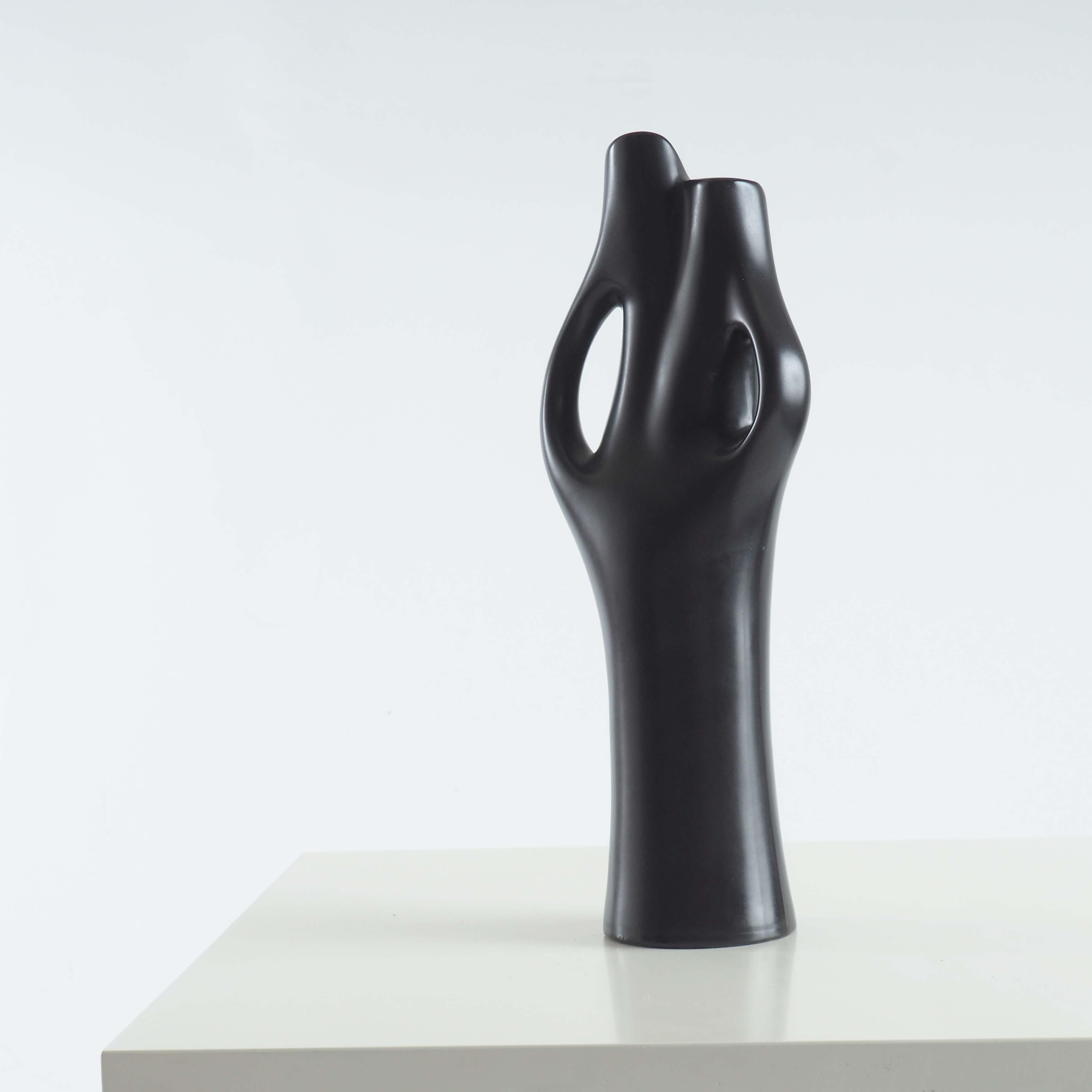 Large Mangania vase by Lillemor Mannerheim for Gefle Porslinsfabrik, Sweden. Beautiful soft body like shapes with a matte black glaze.

 