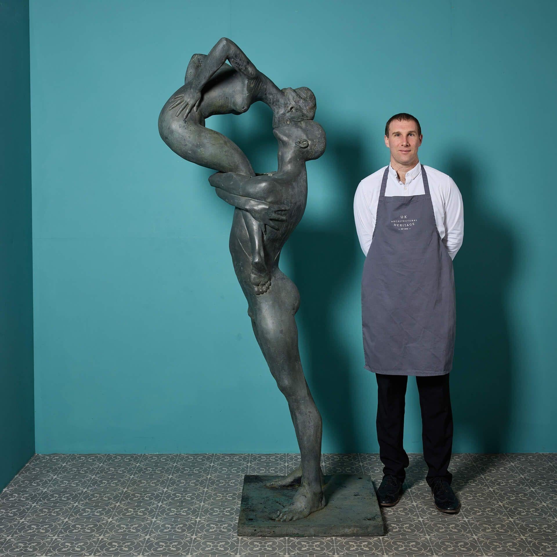 A large cold cast bronze resin maquette sculpture titled 'Close Affection' by the acclaimed British sculptor, John W. Mills.

Made from resin with a patinated bronze finish, this life-size figure stands upon an integral rectangular base.

This piece
