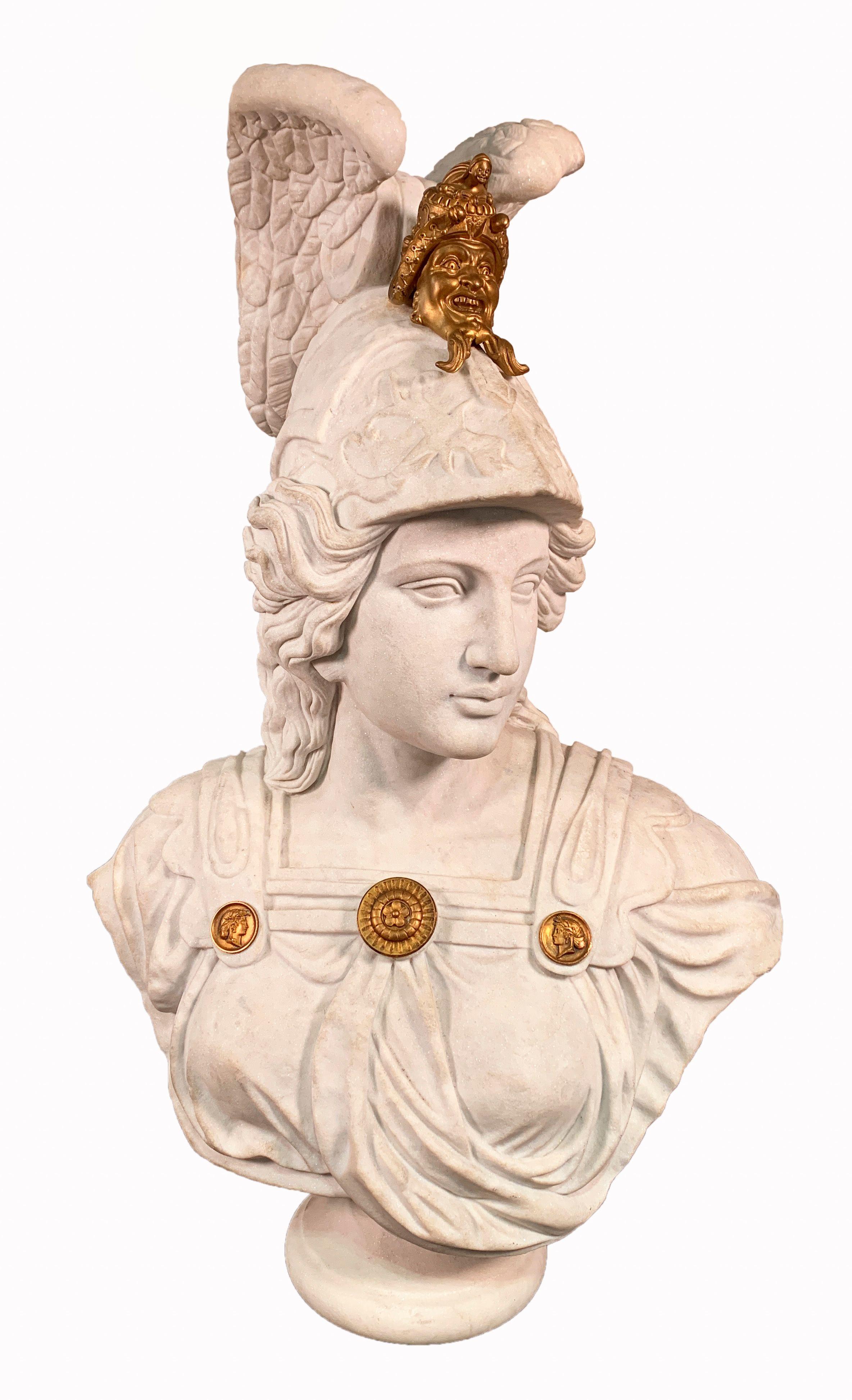A large Italian hand carved white marble gilt-bronze mounted sculpture - bust of Minerva draped in classical attire, wearing a helmet on a white marble socle.

Dimensions: 
Height: 36