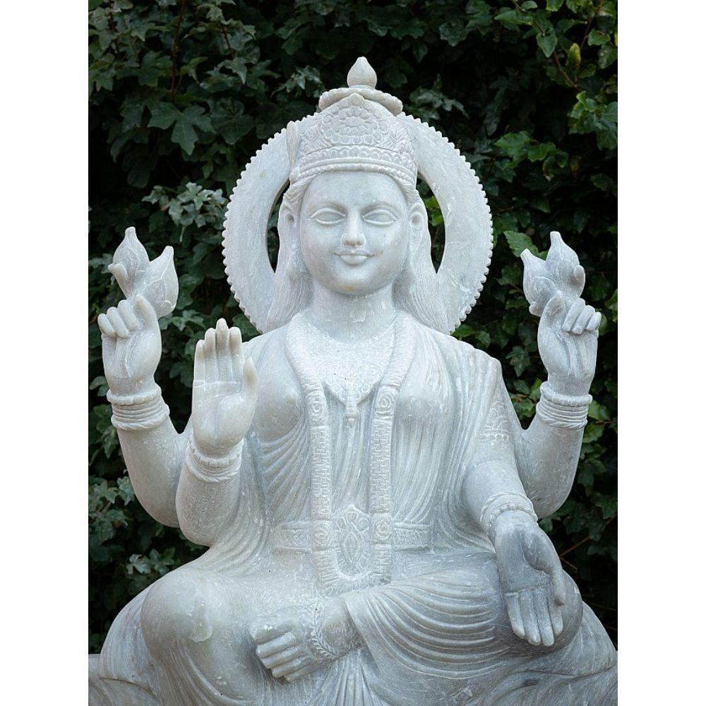 Material: marble
105 cm high 
64 cm wide and 29 cm deep
Originating from India
Hand carved from a single block of white marble
A beautiful piece !
Can be shipped worldwide
Estimated weight : +/- 350 kg

