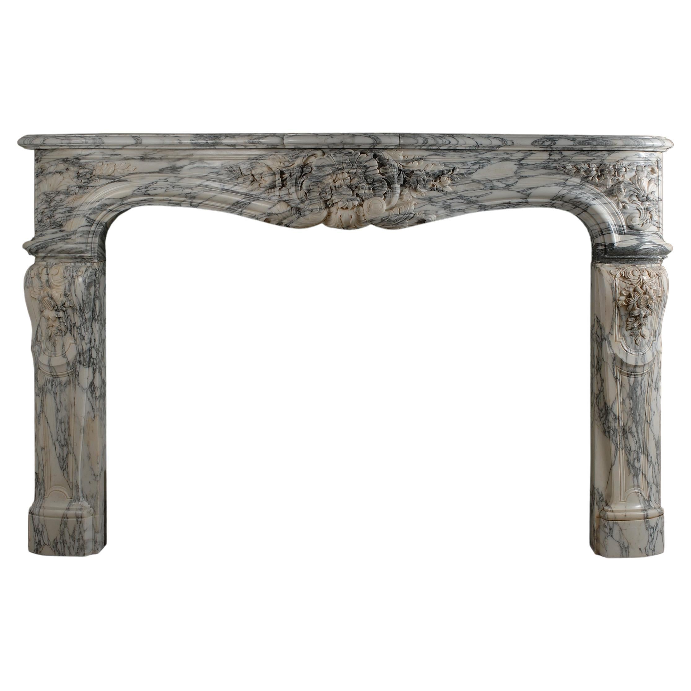 Large marble mantel in the Louis XV style For Sale