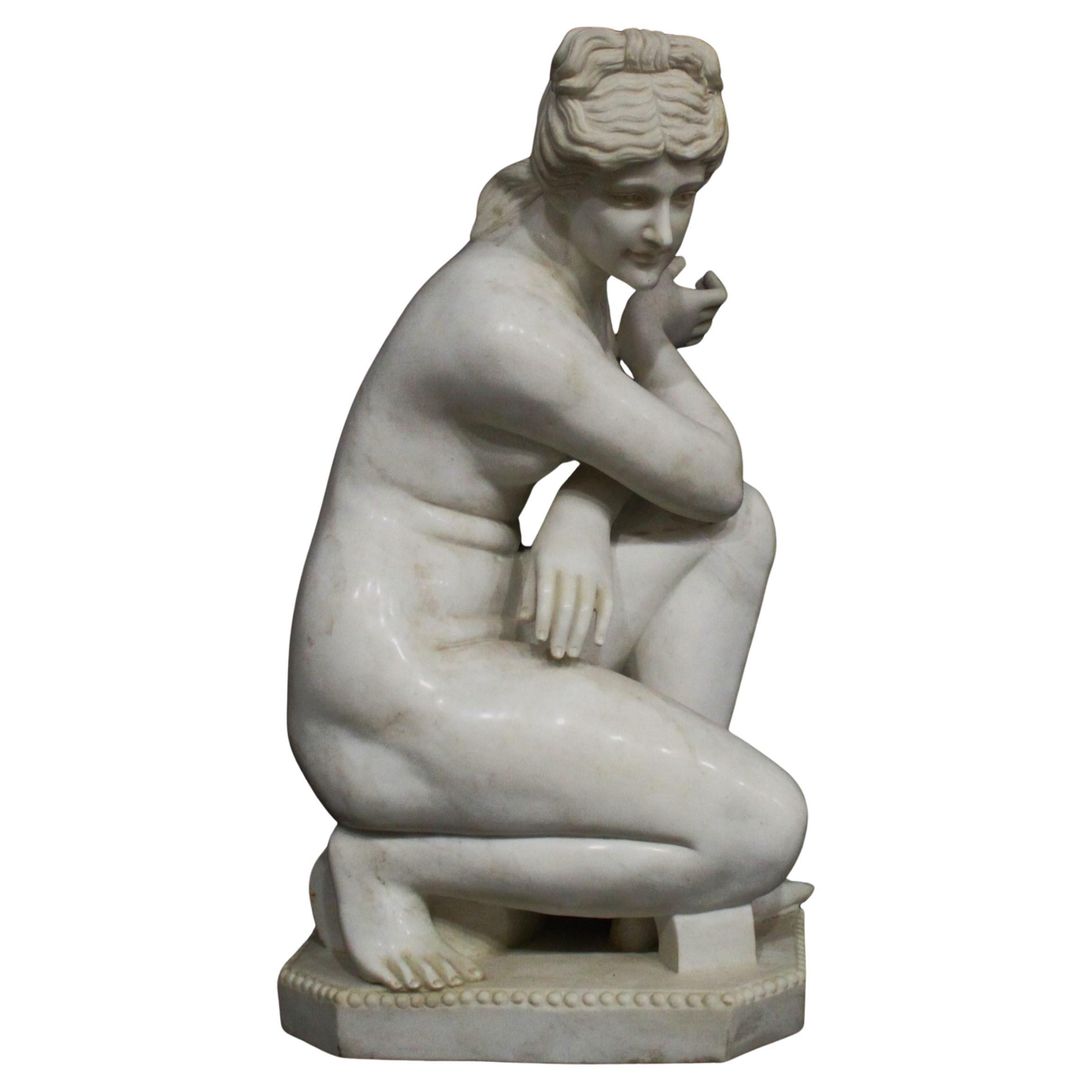 Large marble sculpture of a Crouching Venus, 92 cm high