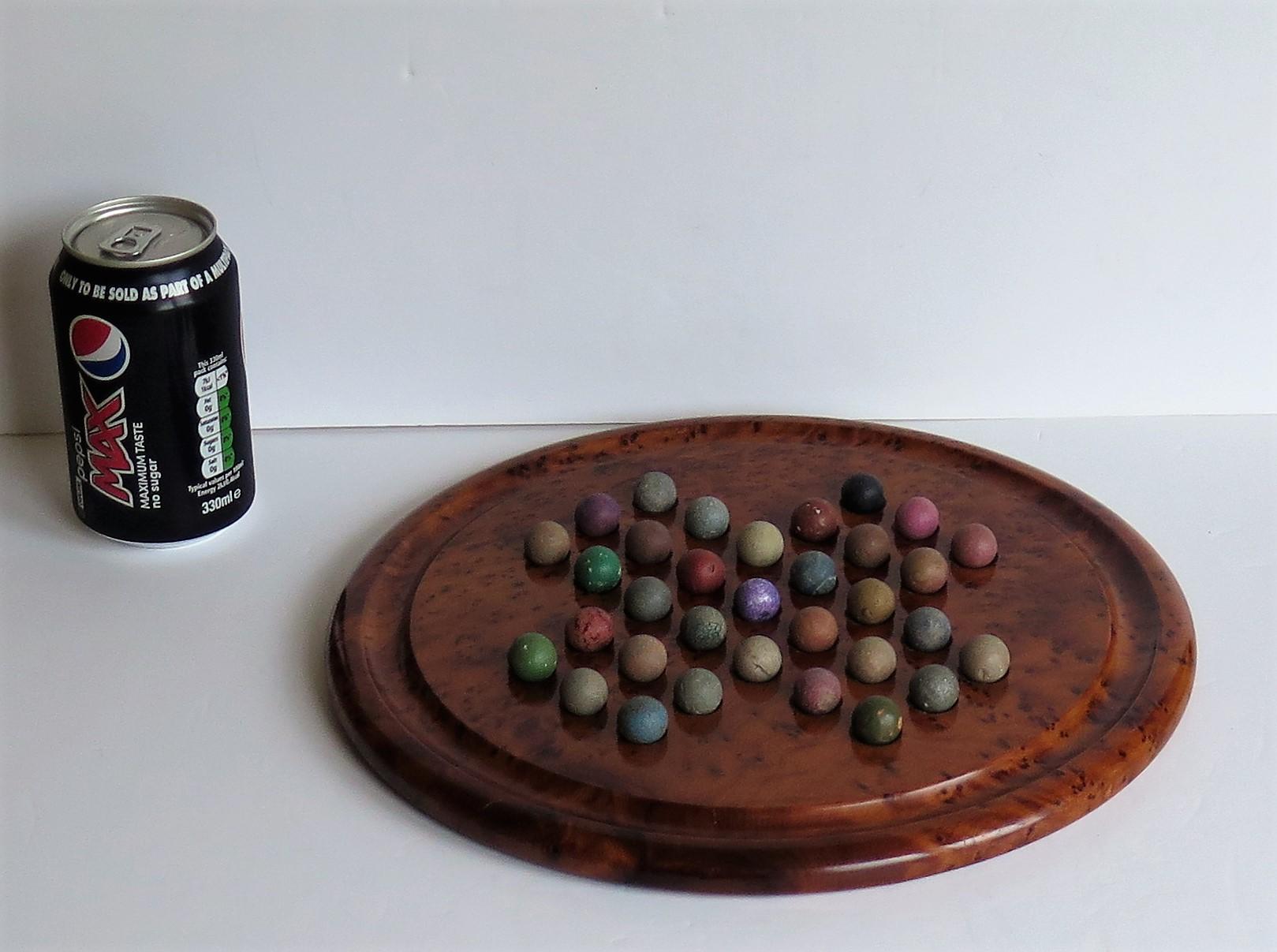 Large Marble Solitaire Board Game with 33 Early Handmade Clay Marbles For Sale 3