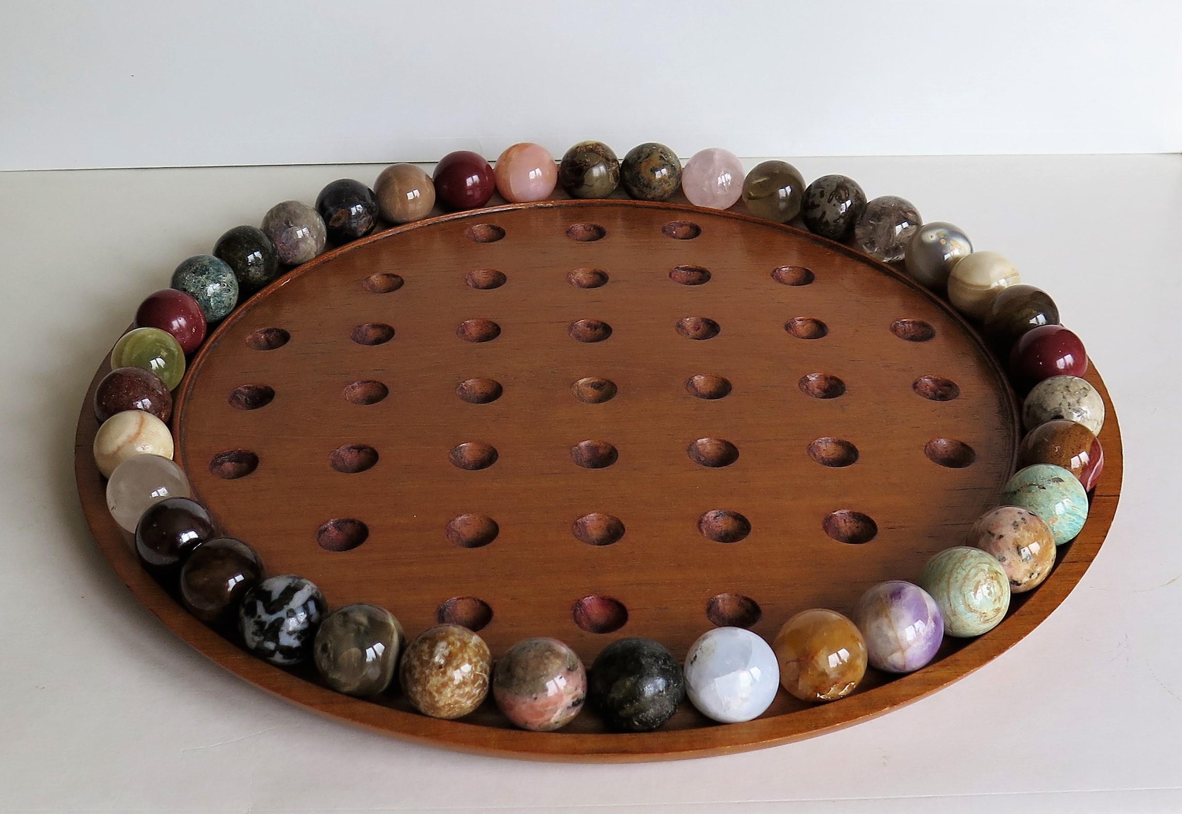 Large Marble Solitaire Board Game with 37 Agate Marbles, Late 19th Century 1