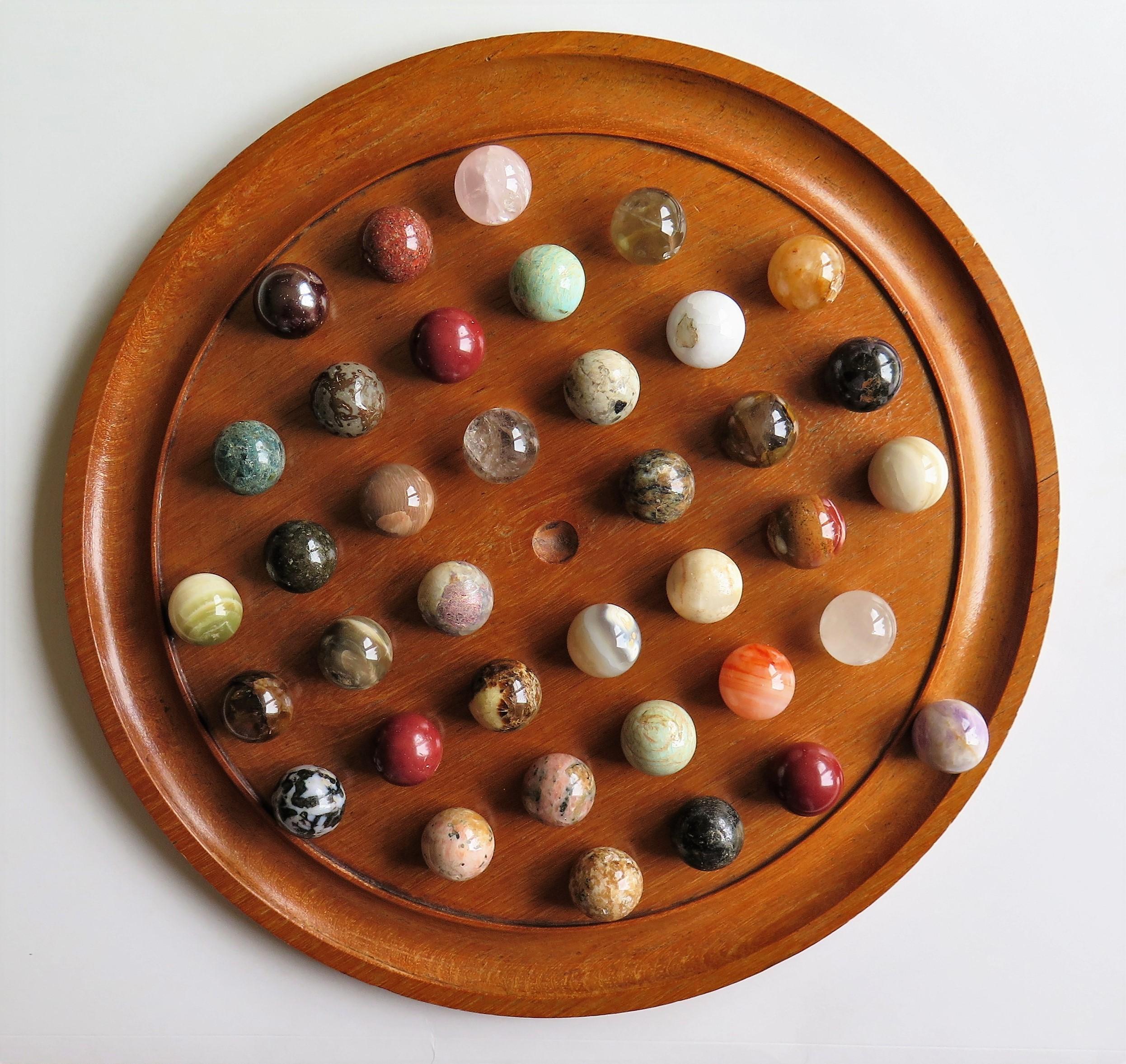 Large Marble Solitaire Board Game with 37 Agate Marbles, Late 19th Century In Good Condition In Lincoln, Lincolnshire
