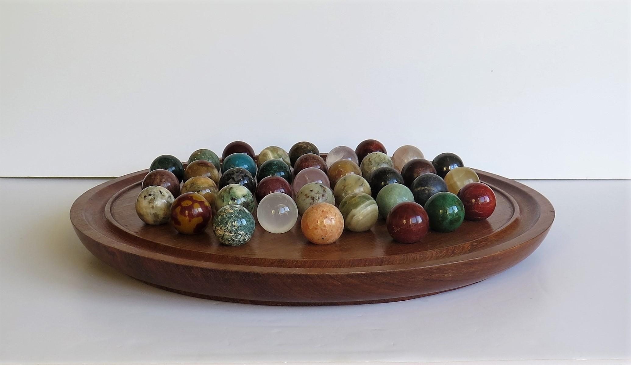 French Large Marble Table Solitaire Game with 37 Mineral Stone Marbles, circa 1920
