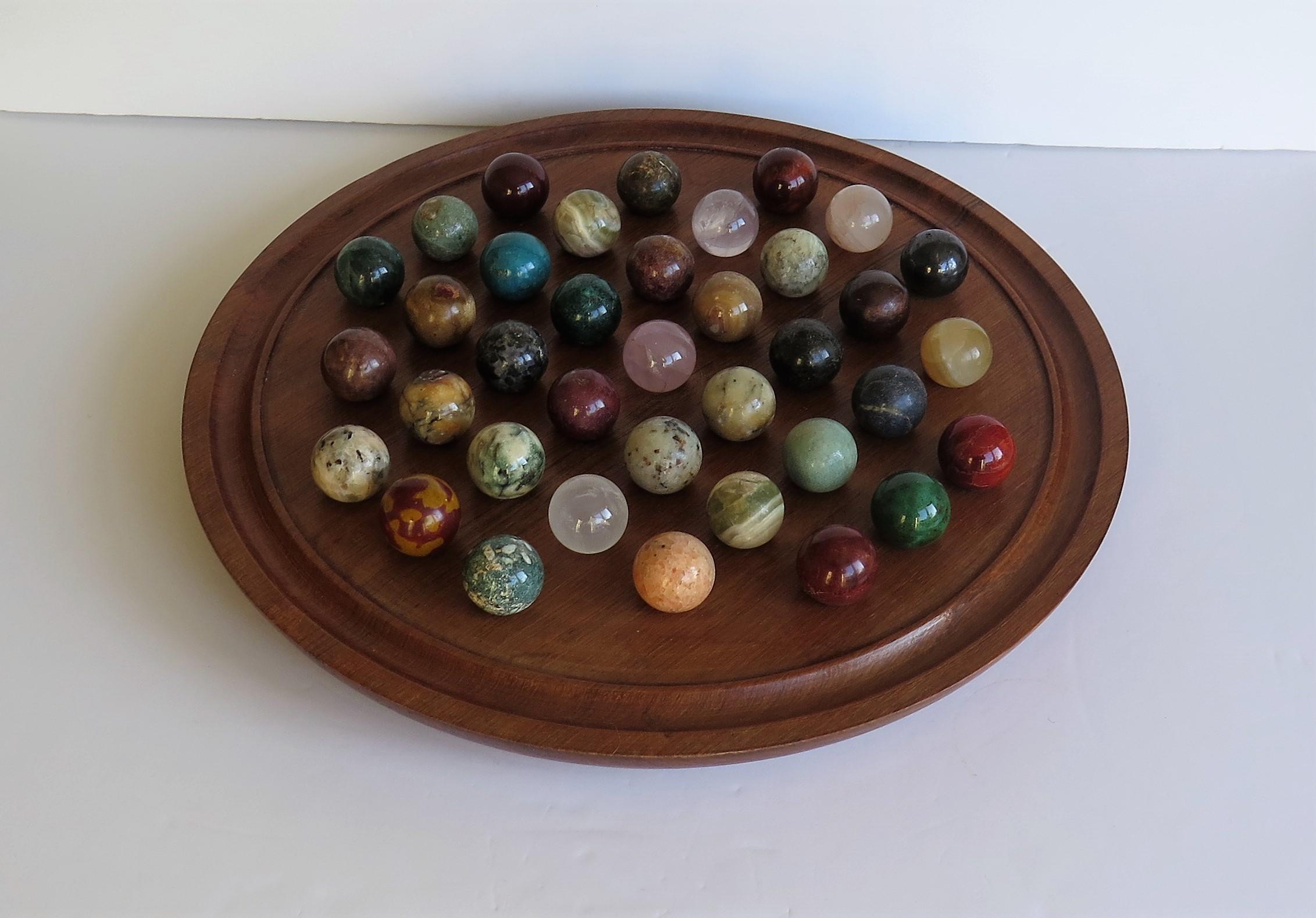 Hand-Crafted Large Marble Table Solitaire Game with 37 Mineral Stone Marbles, circa 1920
