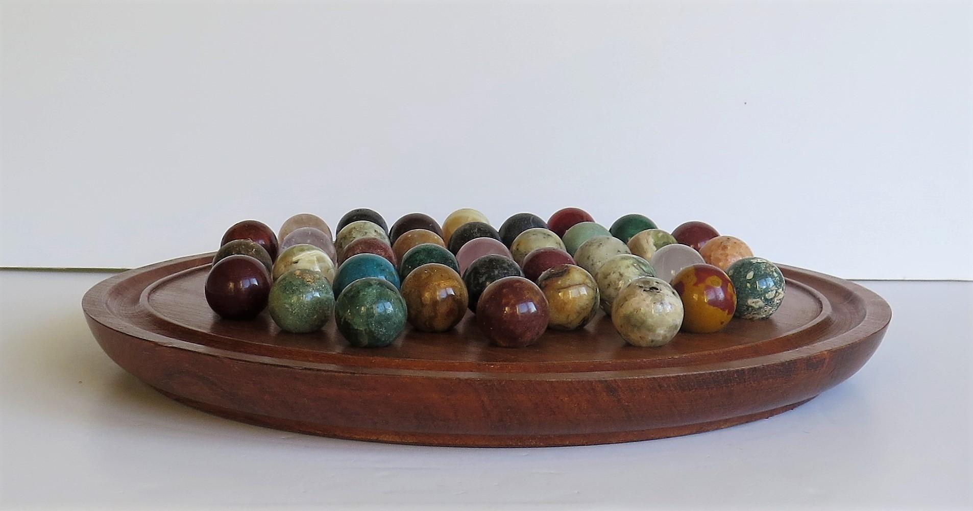 Large Marble Table Solitaire Game with 37 Mineral Stone Marbles, circa 1920 2