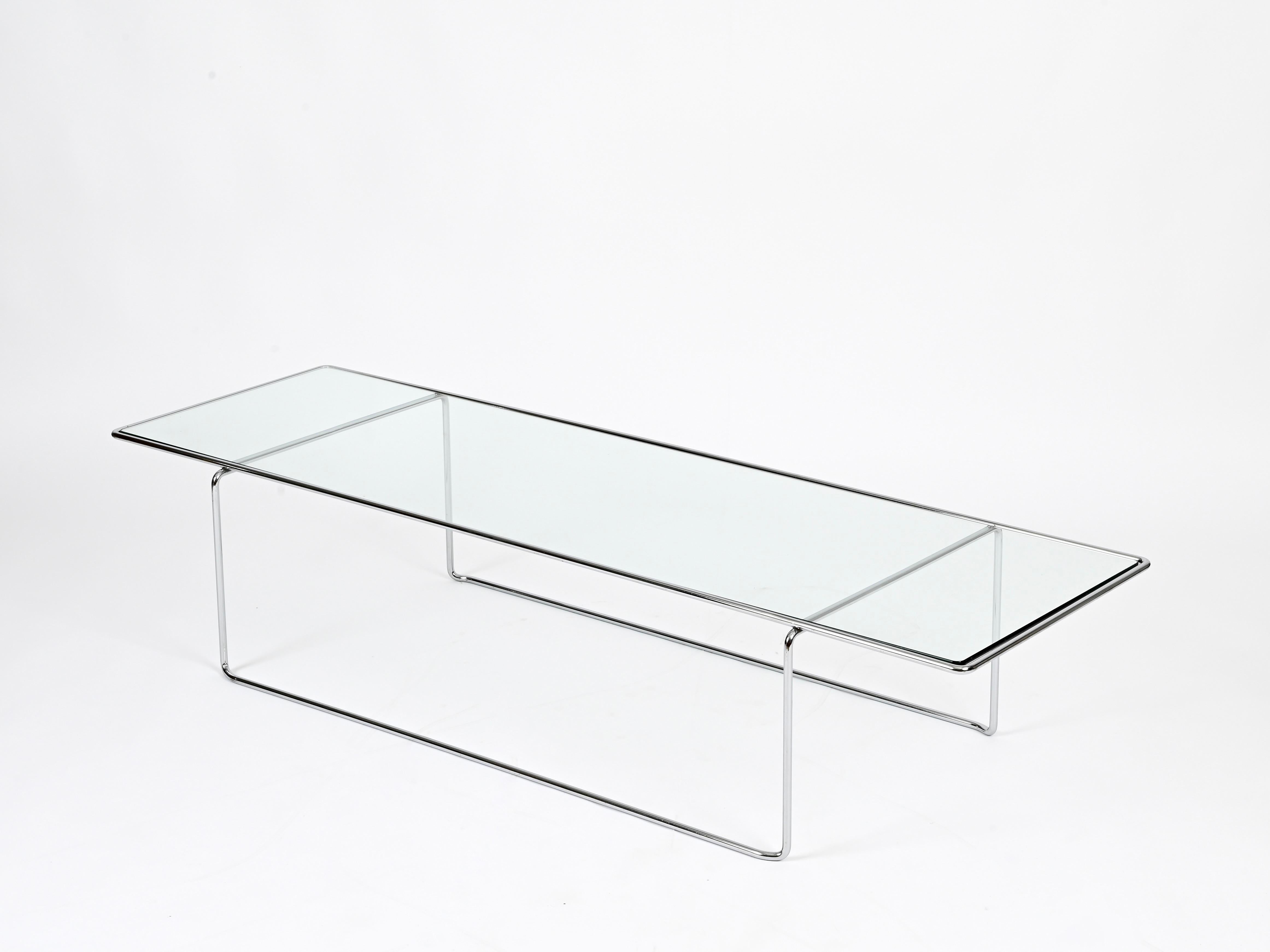 Stunning and very rare “Marcel T” coffee table in chrome-plated steel and crystal, designed by Kazuhide Takahama and produced by Cassina in 1974 as a tribute to Marcel Breuer’s iconic “Laccio” table.

Fully original and in fabulous condition. This