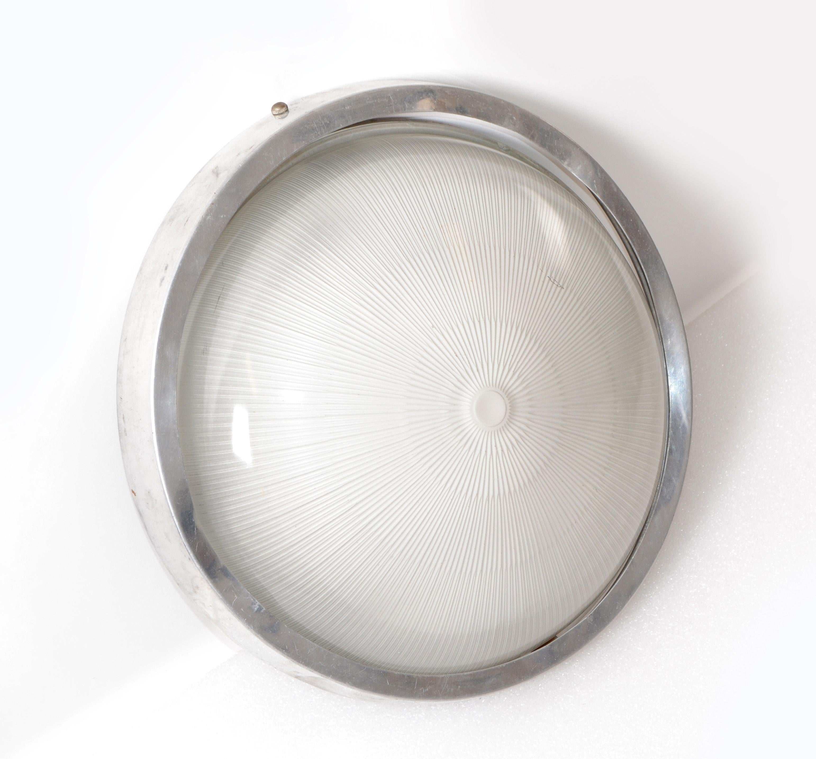 Large Marine flush mount or ceiling light made by Holophane, MOD # 3534, from a Saint Tropez Shipyard.
Original vintage condition, one bulb, 100 watt max bulb.
Great industrial look, and superb light from the Holophane Glass Shade.
Marked