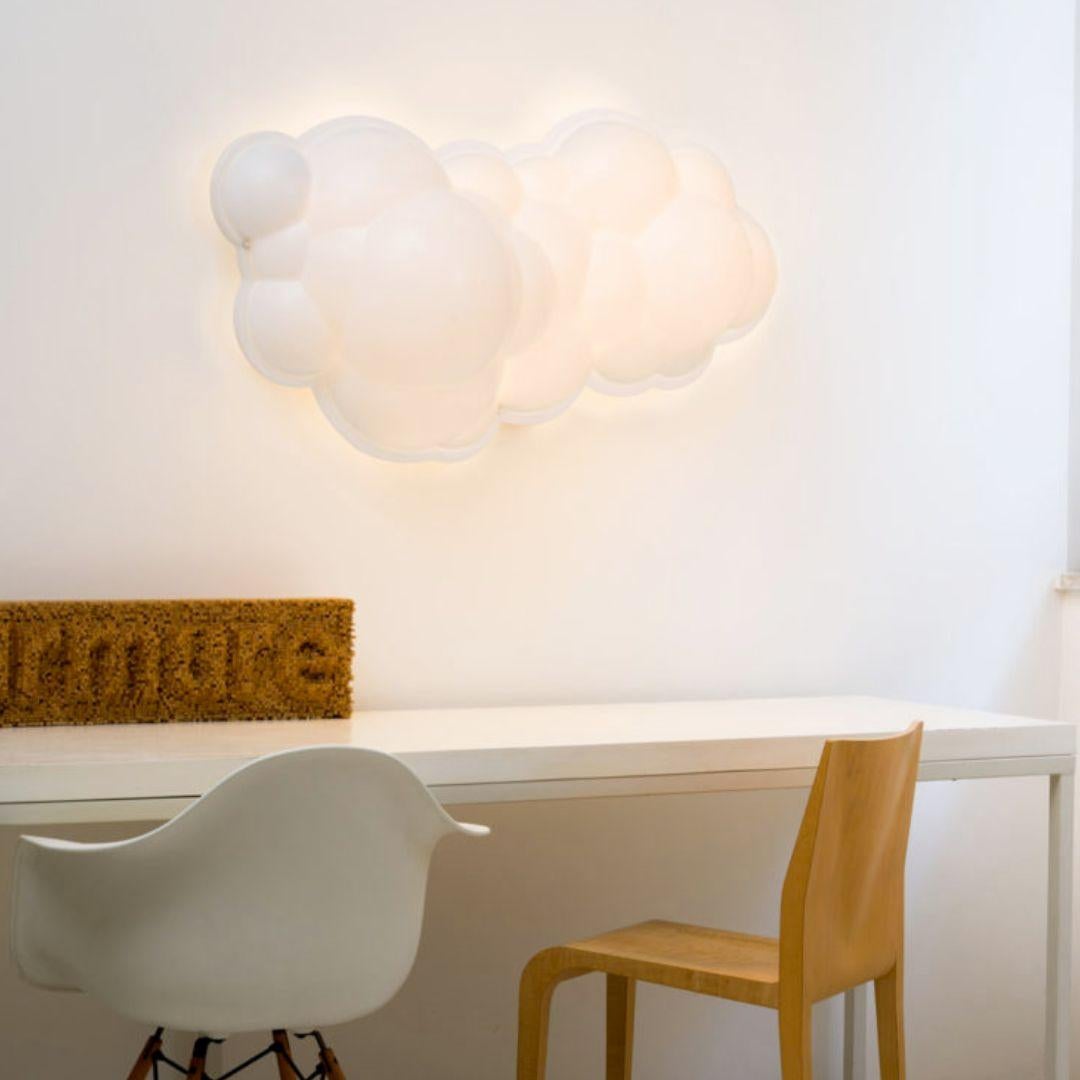 Large Mario Bellini 'Nuvola Minor' Wall or Ceiling Light for Nemo.

A delightful cloud-shaped wall or ceiling lamp designed by Mario Bellini with the structure executed in a natural opal polyethylene. Crafted with rotational molding, the Nuvola