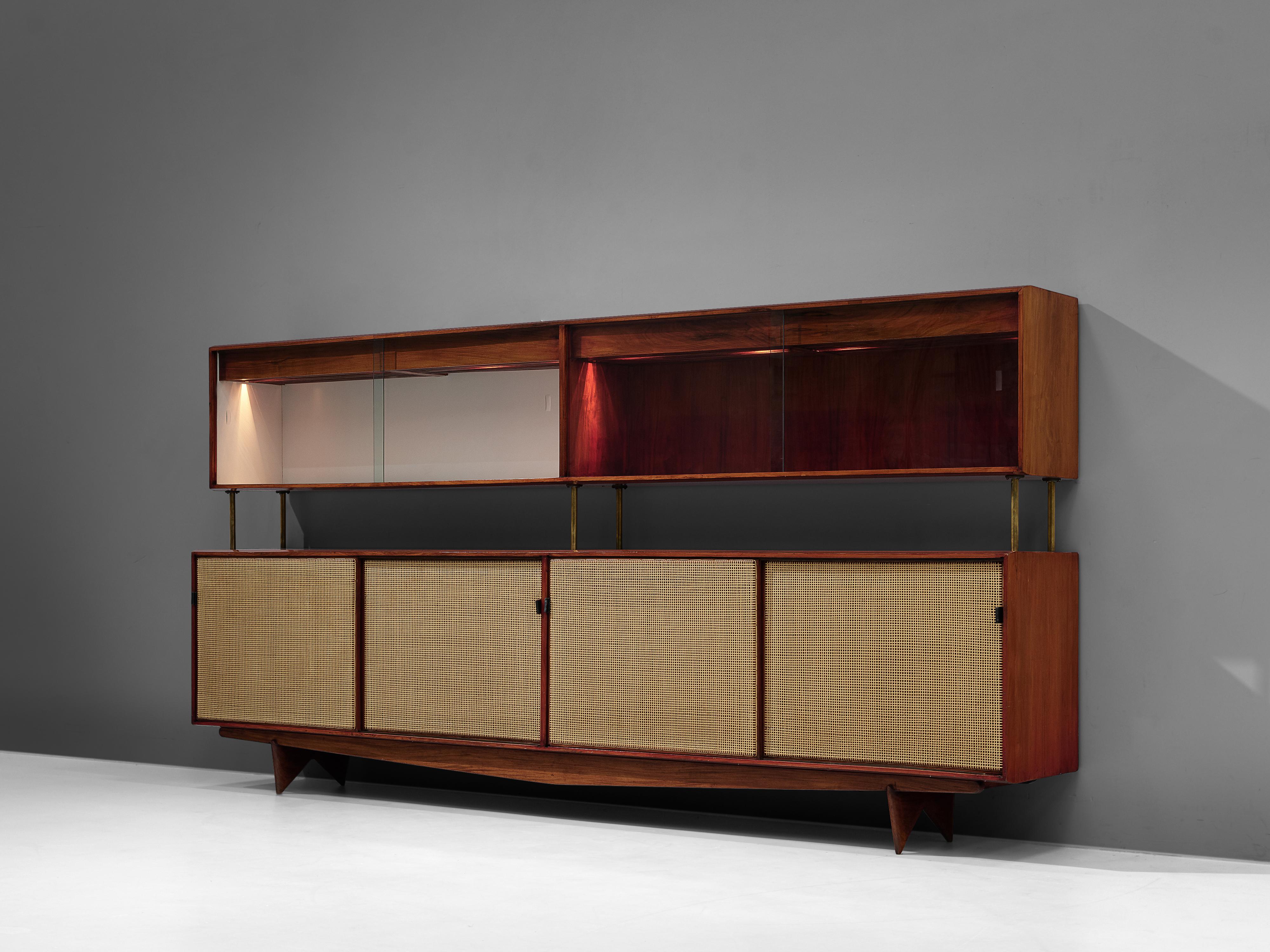 Martin Eisler for Forma, sideboard, Brazilian walnut, glass, brass, seagrass, leather, Brazil, 1950s

Rare Brazilian sideboard by Martin Eisler for Forma. The sideboard is structured in two compartments. At the bottom there is cabinet with four