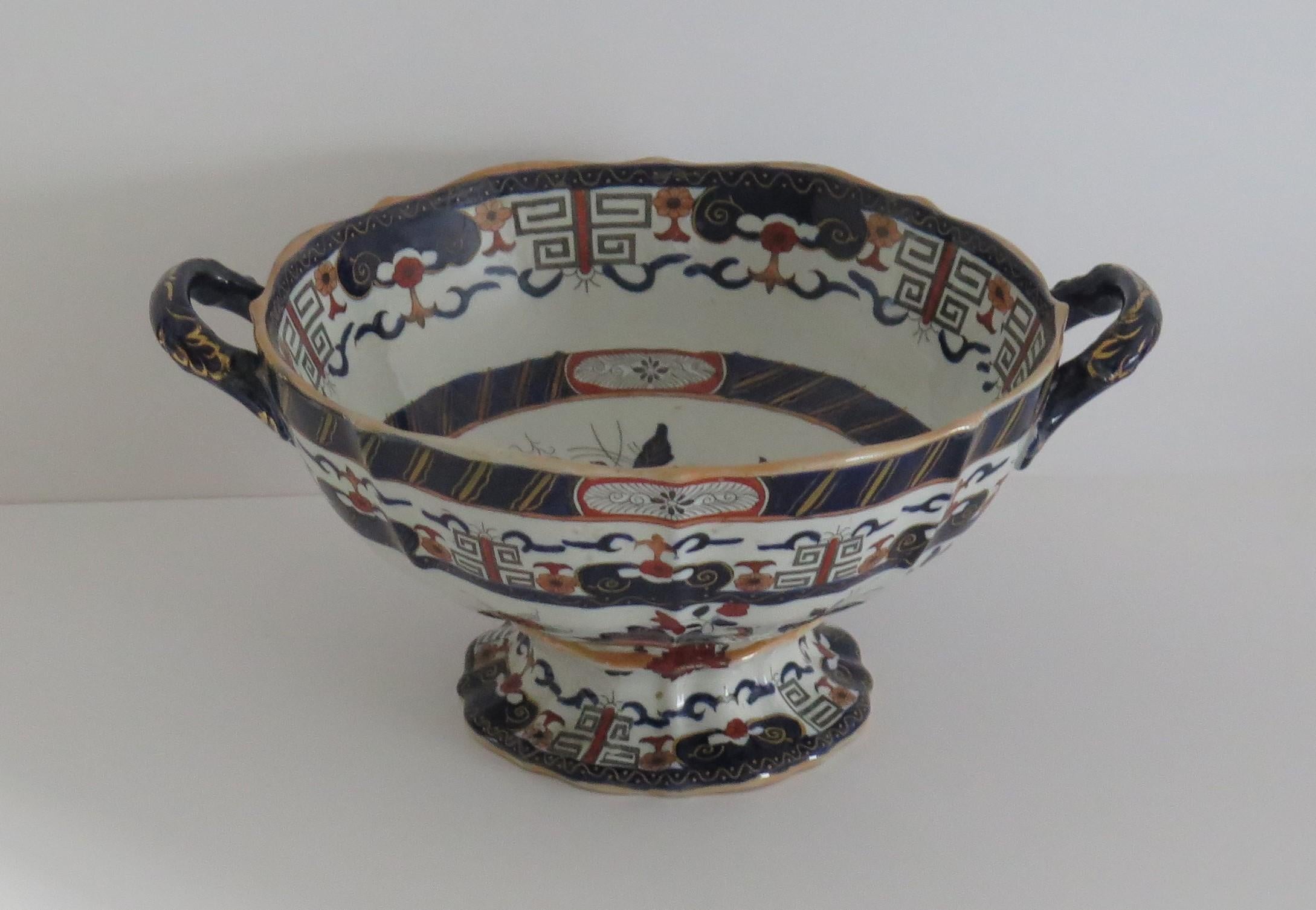 This is a Large twin Handled open Bowl made by Mason's Ironstone in Pattern 2508, called: Floral with Key Border pattern, in the early 19th century, circa 1835 to 1840..

Large Mason's bowls in this shape with a Pedestel foot are rare. 

The bowl is