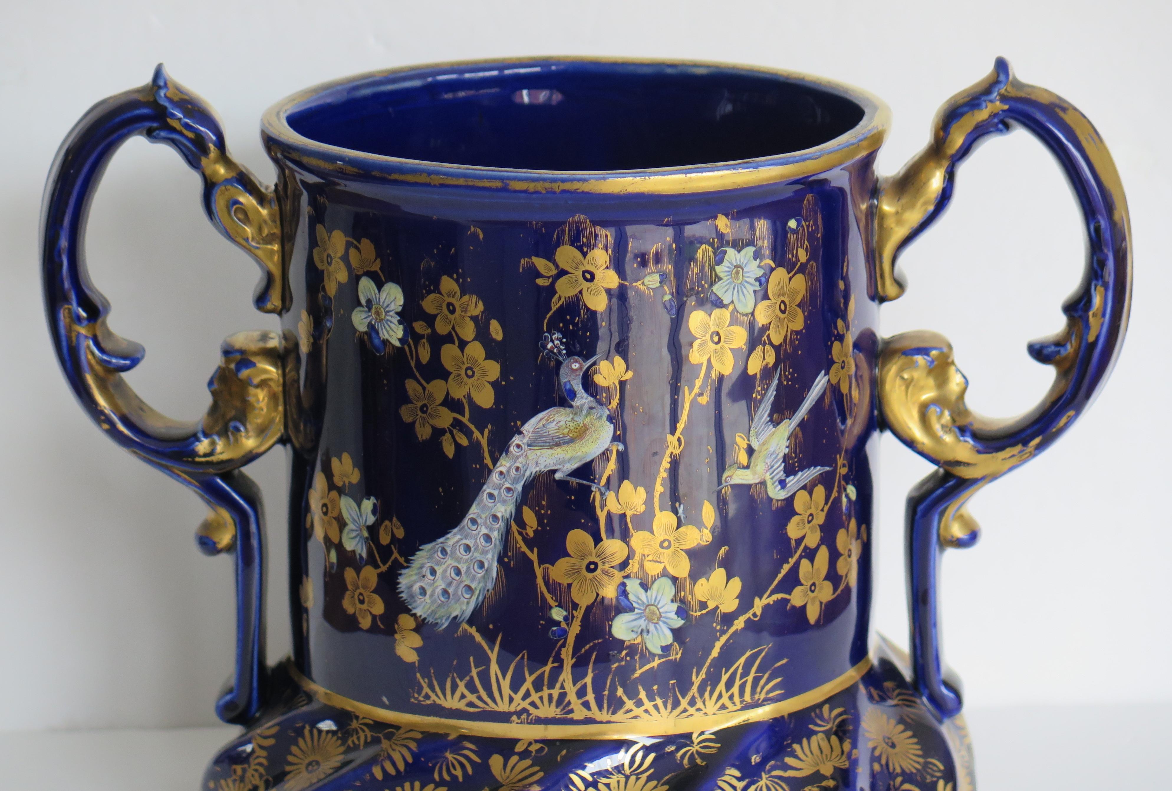 This is a superb very rare, fine quality ironstone Two Handled Pot, all beautifully hand painted, made by Mason's Patent Ironstone China Company, of Lane Delph, Staffordshire, England, circa 1820. 

This piece is substantial and heavily potted,