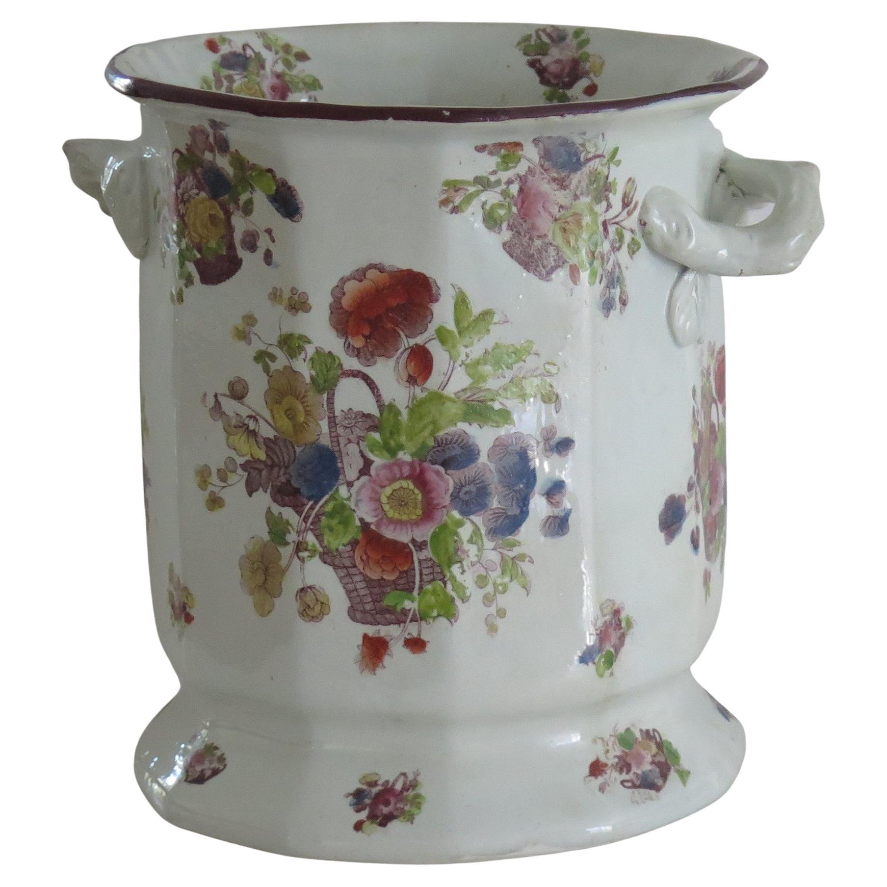 This is a very rare, ironstone Two Handled, Ice Pail or Wine Cooler Pot, made by Mason's Patent Ironstone China Company, of Lane Delph, Staffordshire, England, circa 1818. 

This piece is substantial and heavily potted, weighing about 2.2 Kg
